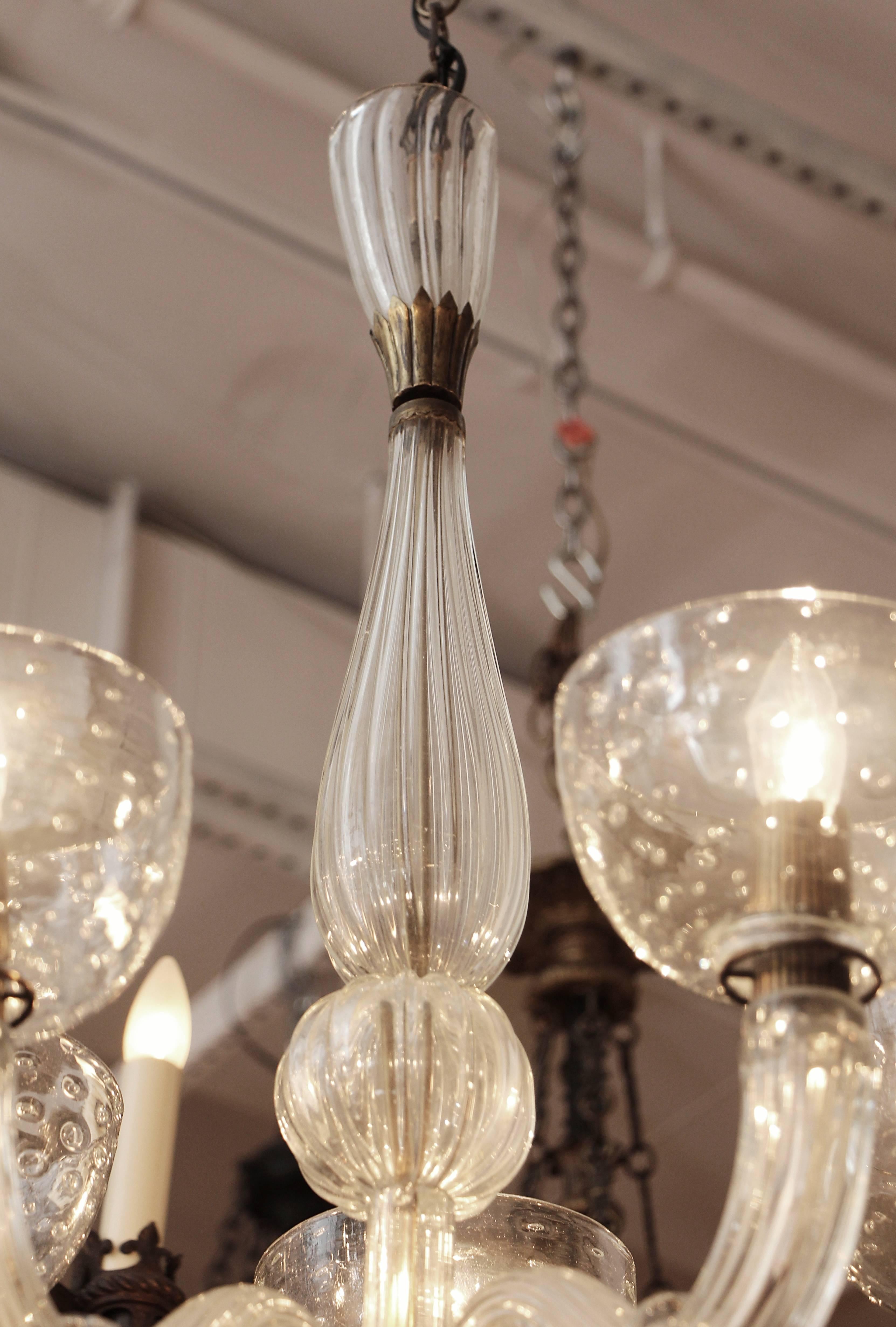 1950s Segusa Italian fluted and bubble blown glass and brass Mid-Century Modern five-arm chandelier. This item can be viewed at our 5 East 16th St, Union Square location in Manhattan.