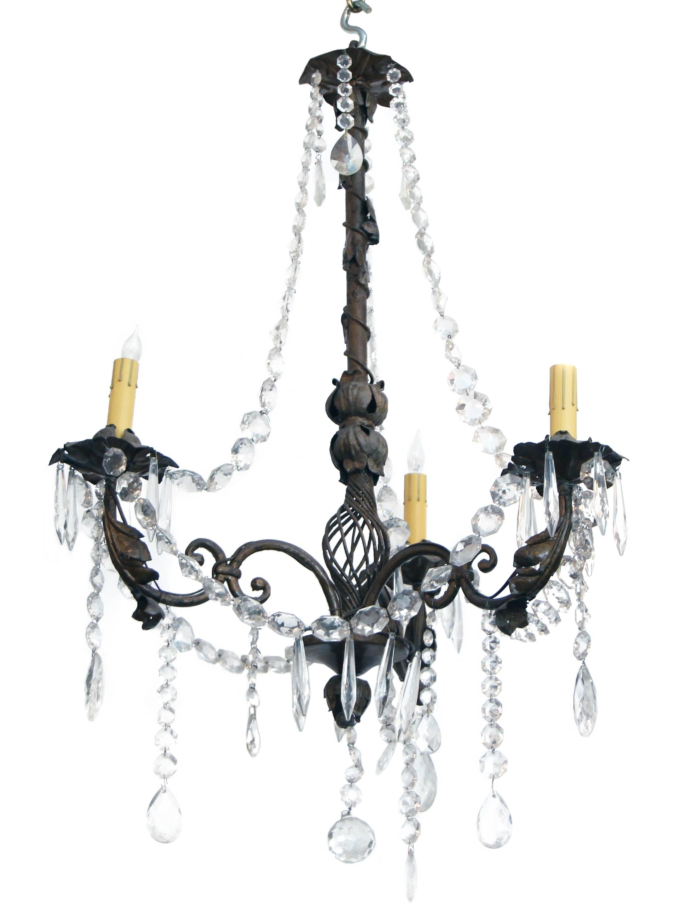 French leafed bronze three arm chandelier with beaded crystals hanging throughout. Cleaned and rewired. Please note, this item is located in one of our NYC locations.