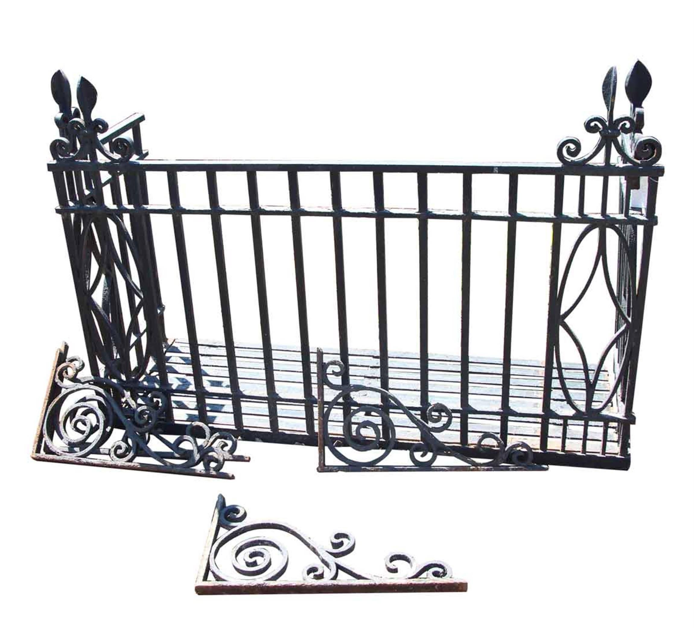 Original turn of the century 1905 wrought iron Georgian balcony, complete with the original wrought iron brackets and finials. The finials and brackets are all hand pounded and handsmithed. The original riveted iron strap floor is included. This can