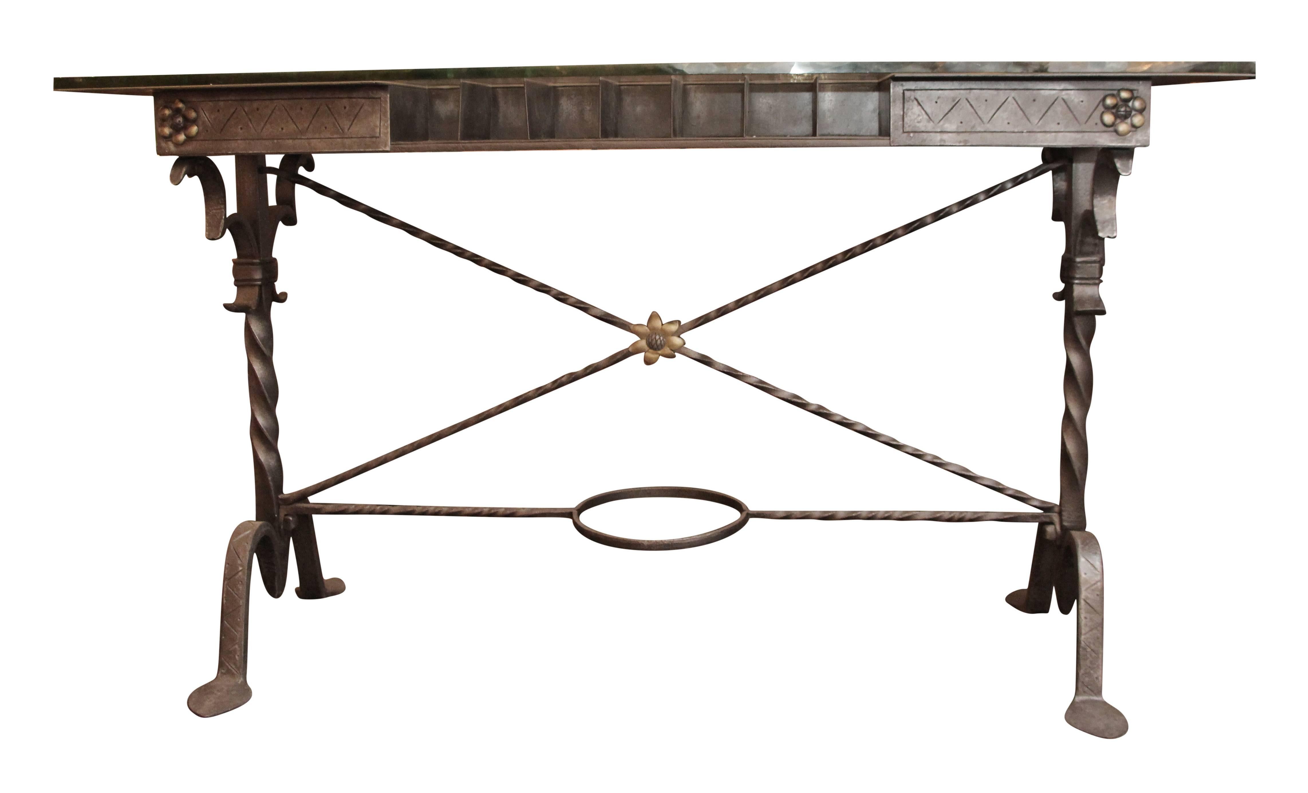 Samuel Yellin (1884-1940) was one of the foremost, if not the foremost, American master blacksmith and metal designer of the early 20th century. This hand-forged intricately 1920s hand wrought iron table is put together by bands and pins without any