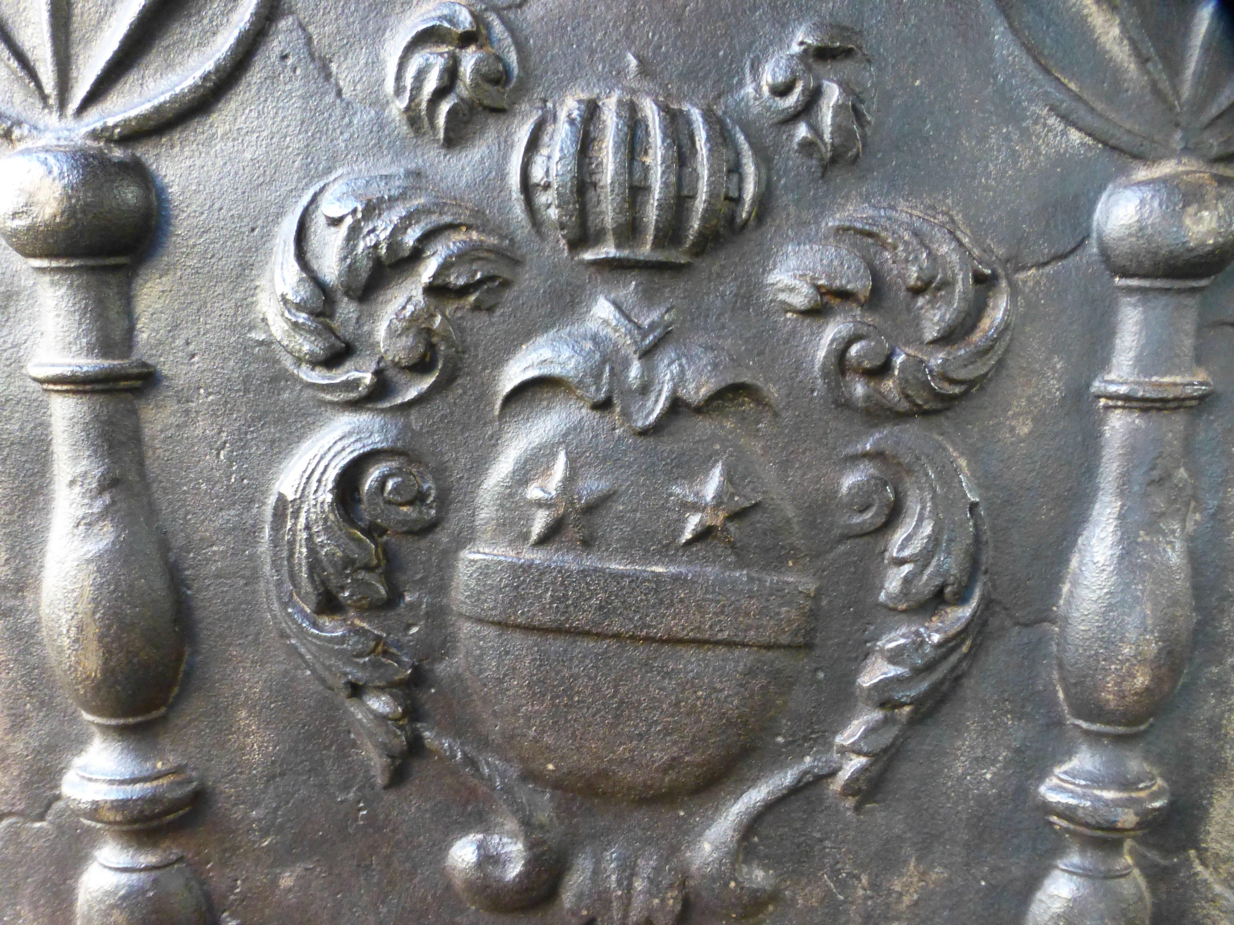 18th century French fireback with coat of arms and date 1717.

All our products that weigh 66 kg / 146 lbs or more are shipped as standard door-to-door freight. The prices of freight have increased tremendously since Covid-19, especially when