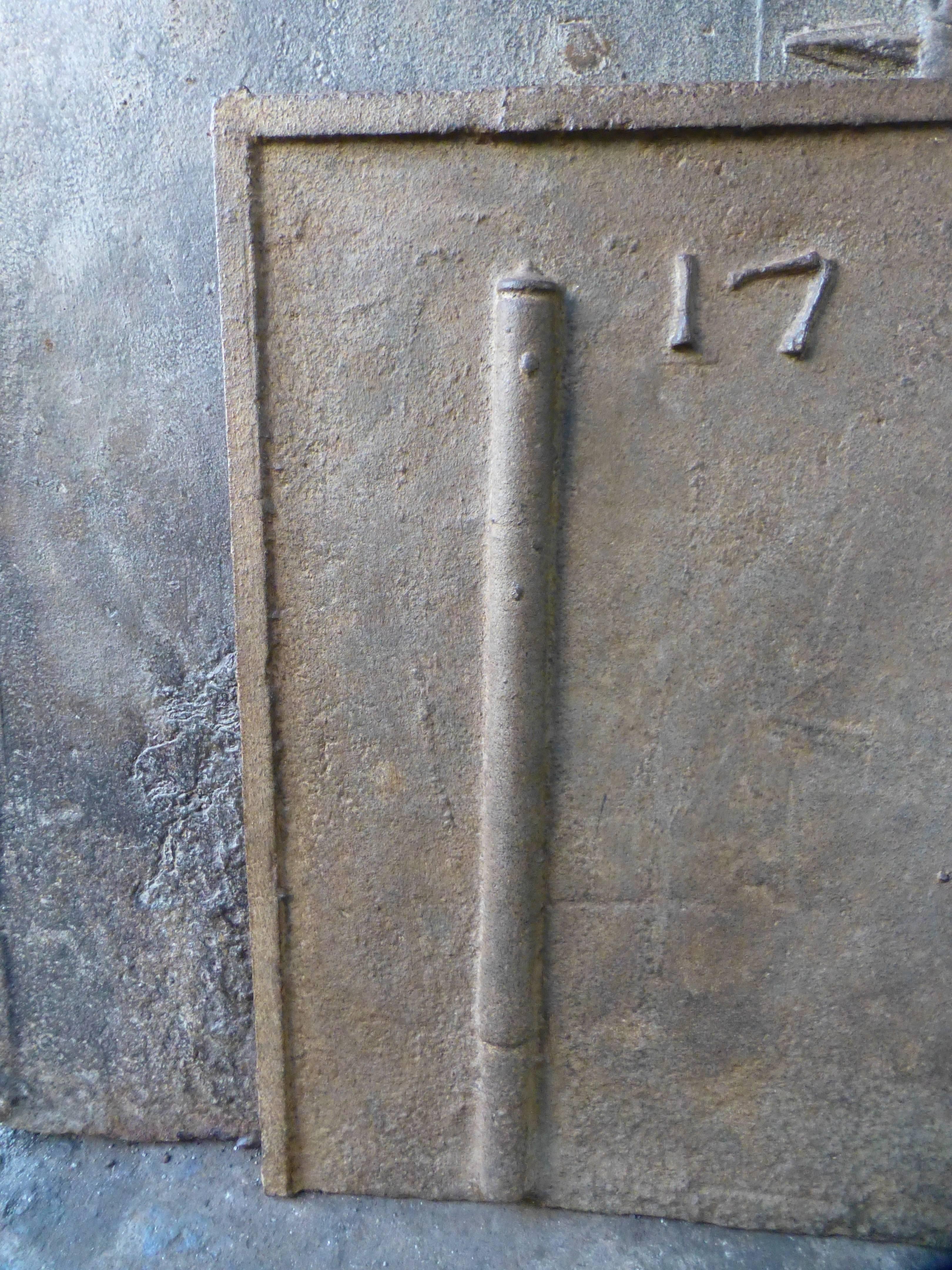 18th century French fireback with pillars and date 1786.

    
