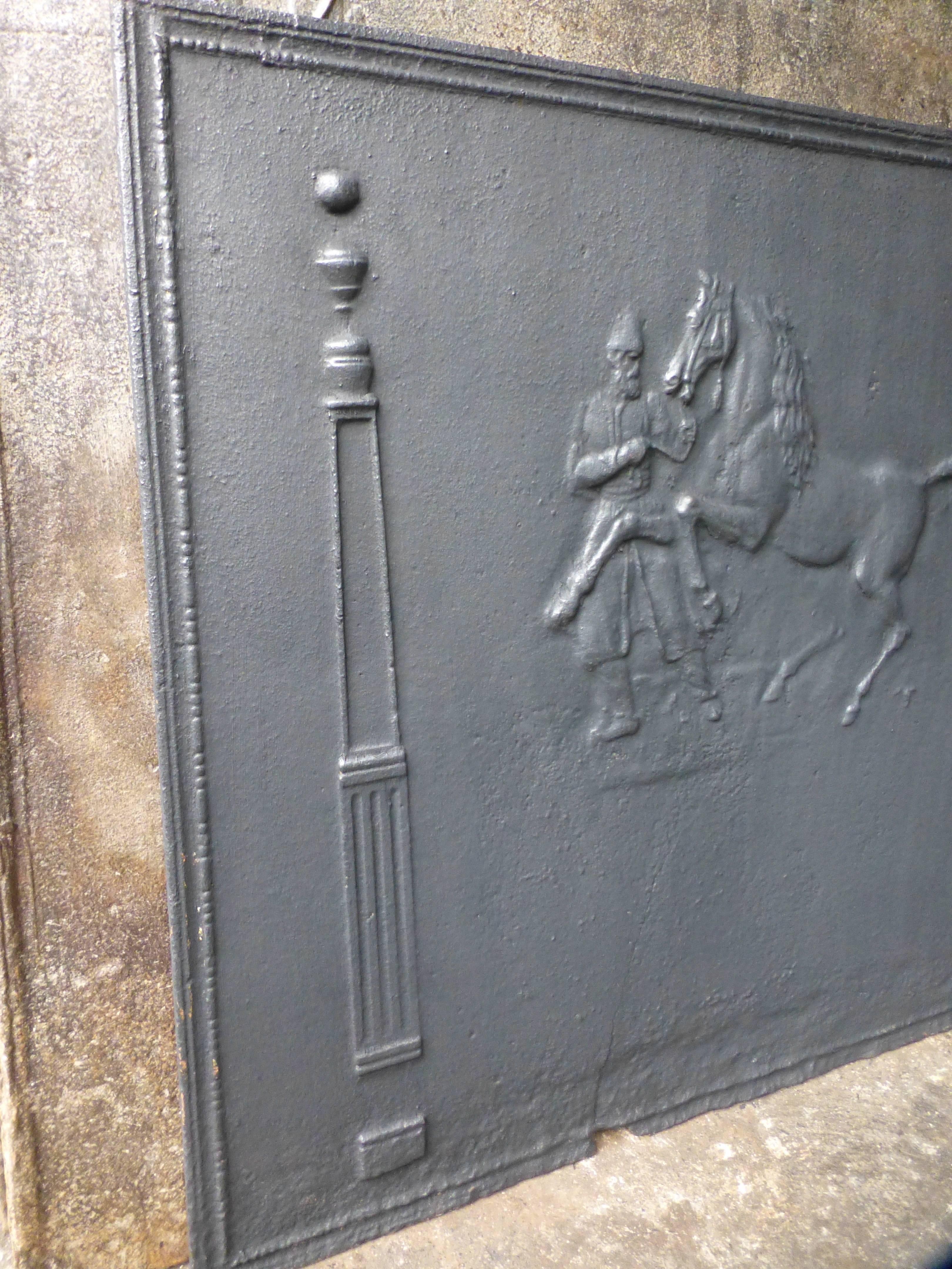 19th century French cast iron fire back with horseman, horse and pillars.

We always have 500+ antique firebacks in stock in all styles and dimensions that can be ordered on line. See our website for our current stock and prices.