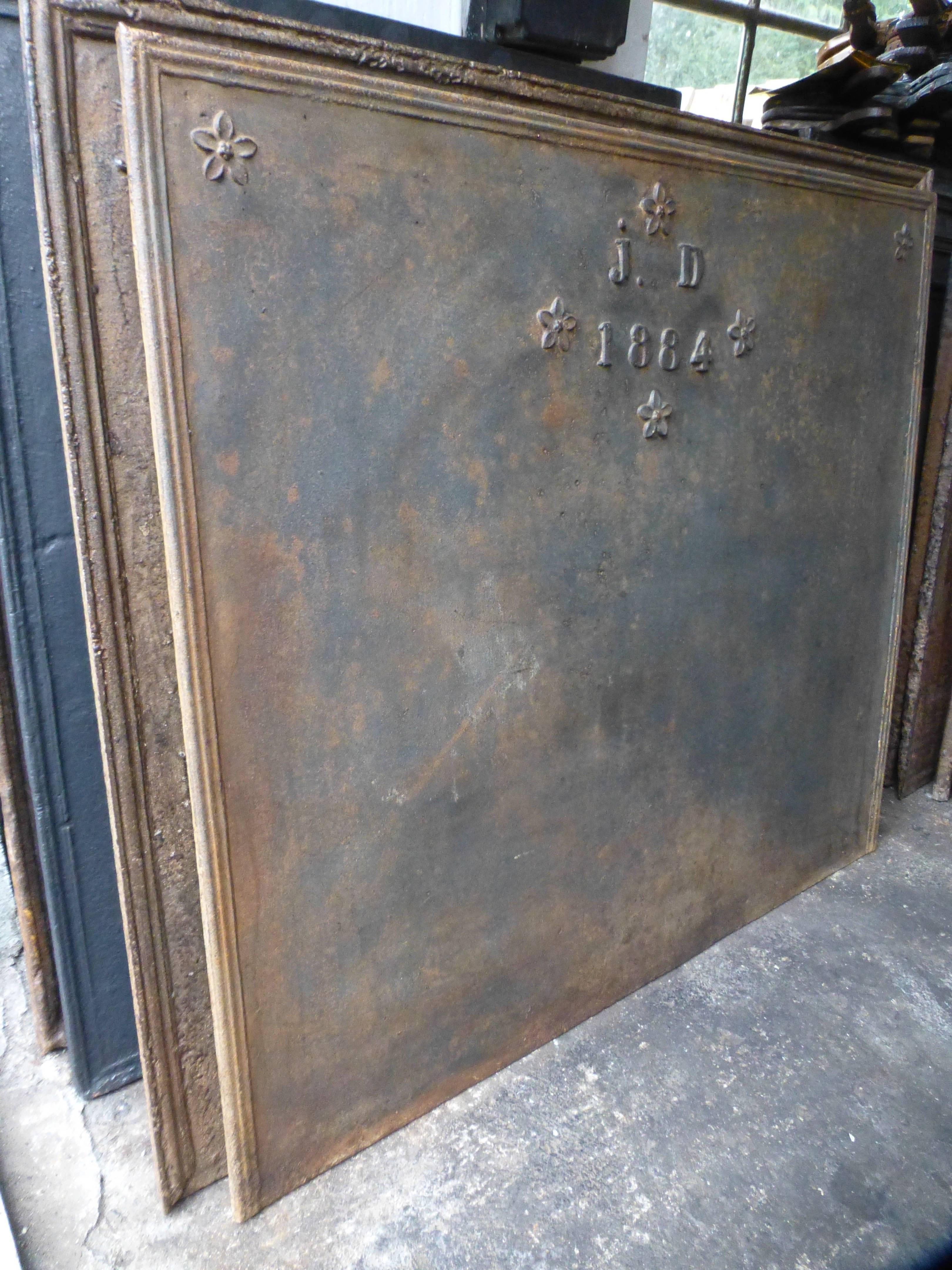 19th century French fireback with initials and the date 1884.

We have a unique and specialized collection of antique and used fireplace accessories consisting of more than 1000 listings at 1stdibs. Amongst others we always have 300+ firebacks, 250+