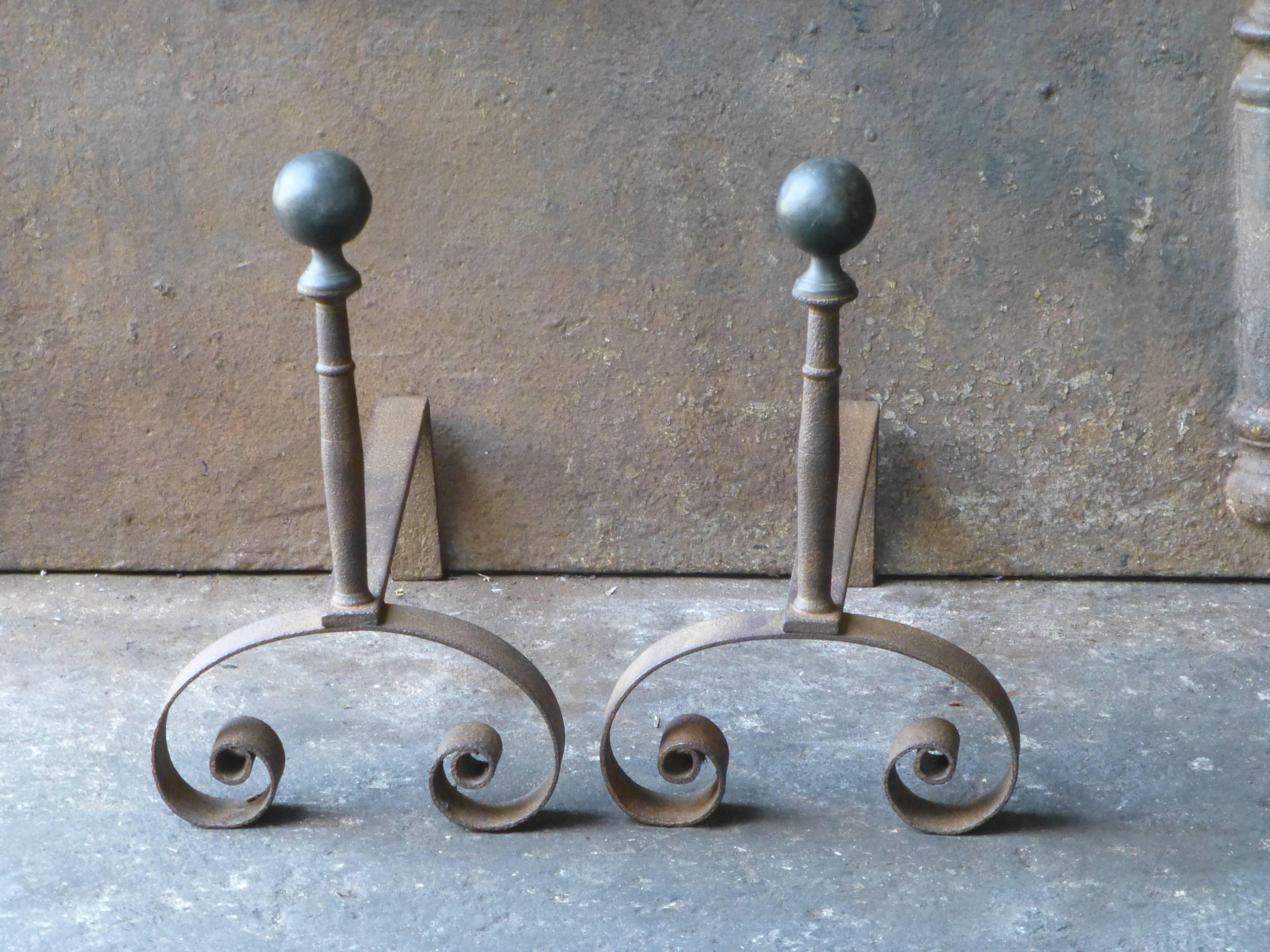 19th century French firedogs, andirons made of wrought iron.