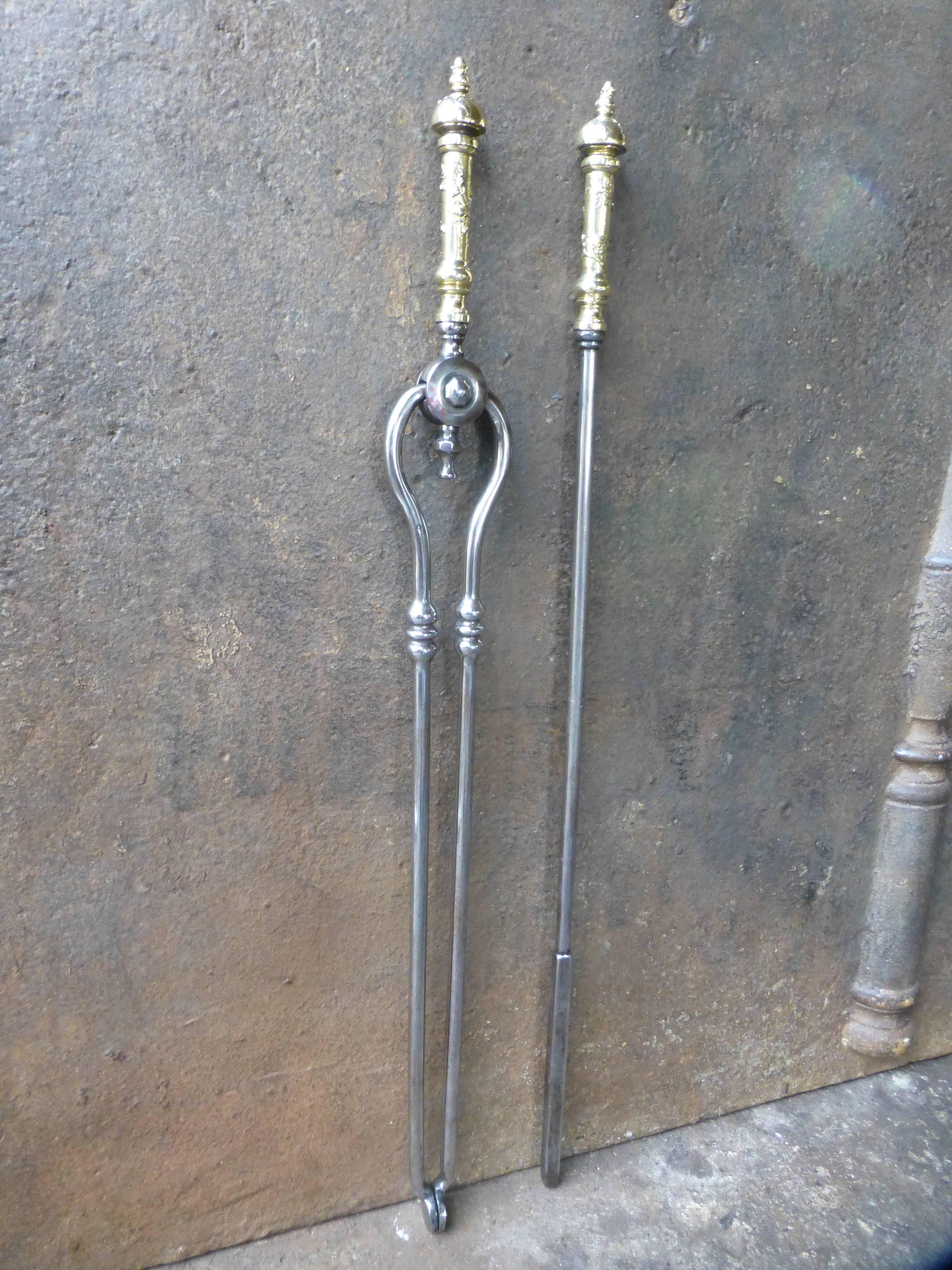 19th century English fire tools made of polished steel with brass handles.

We have a unique and specialized collection of antique and used fireplace accessories consisting of more than 1000 listings at 1stdibs. Amongst others, we always have 500+