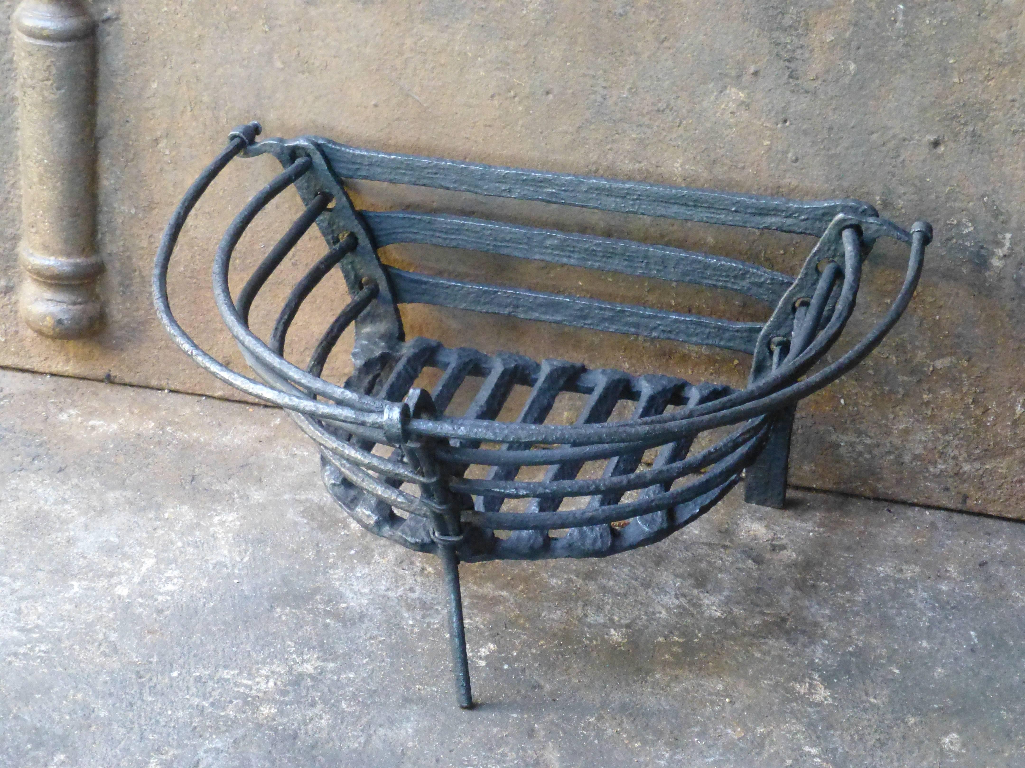 18th century English fire grate - fireplace basket made of wrought iron.
