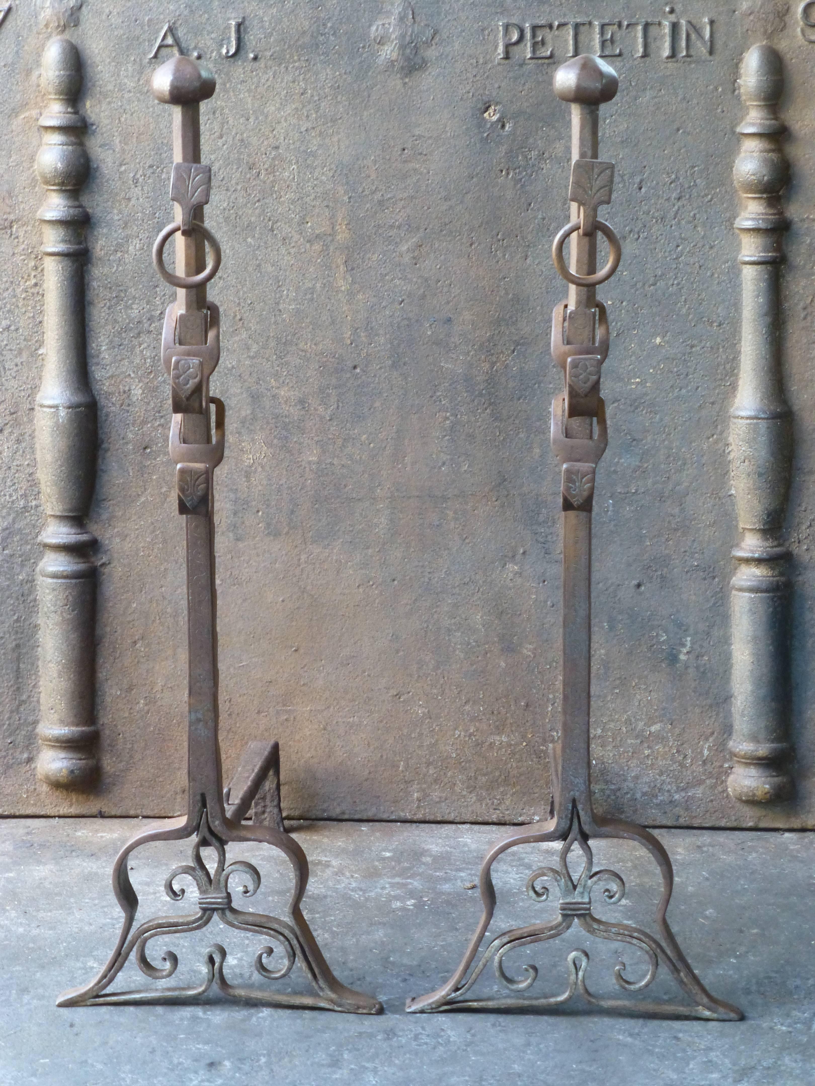 19th century French Napoleon III period fire dogs made of wrought iron. These French andirons are called 'landiers' in France. This dates from the times the andirons were the main cooking equipment in the house. They had spit hooks to grill meat or