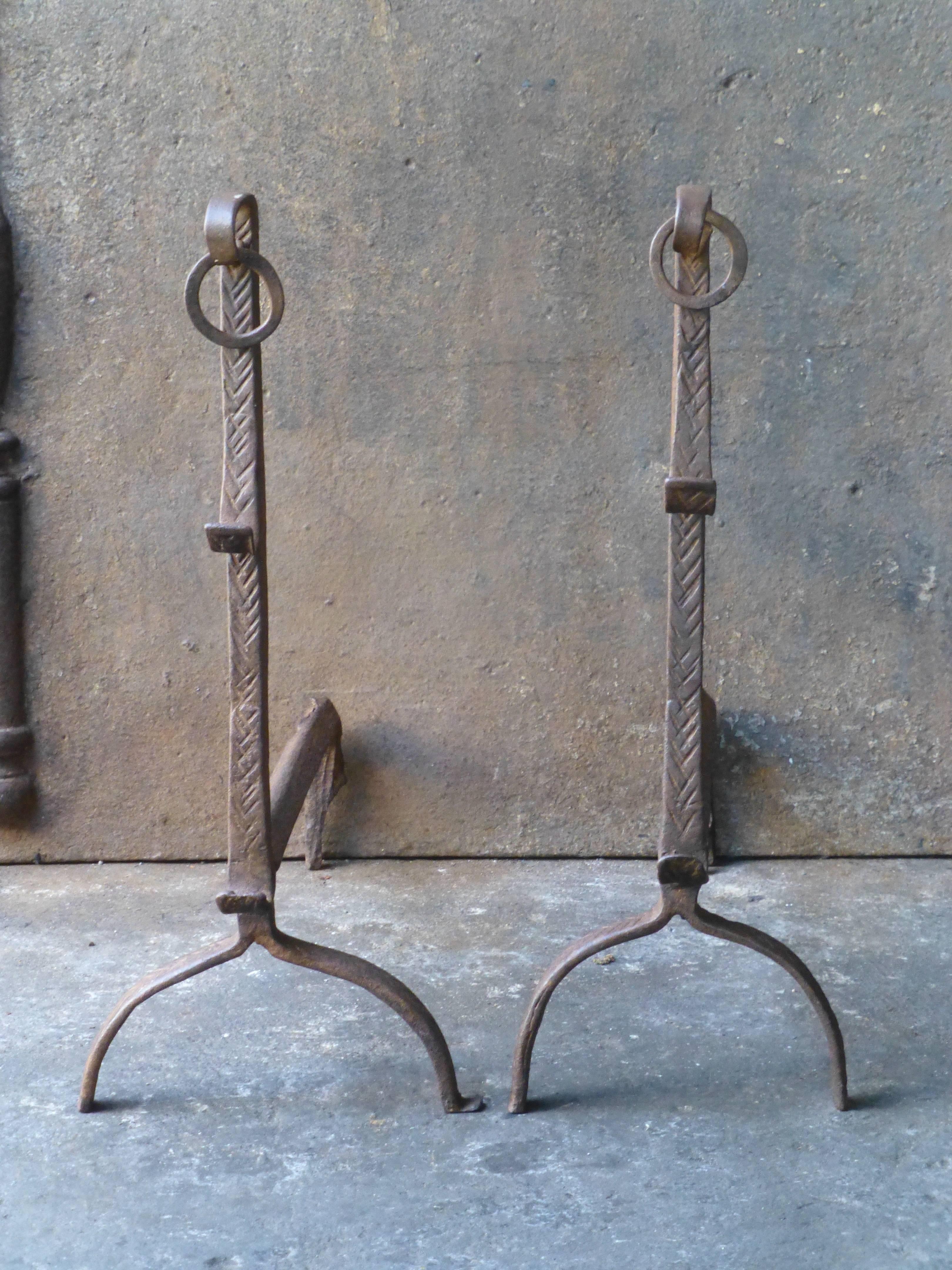 Gothic andirons made of wrought iron.