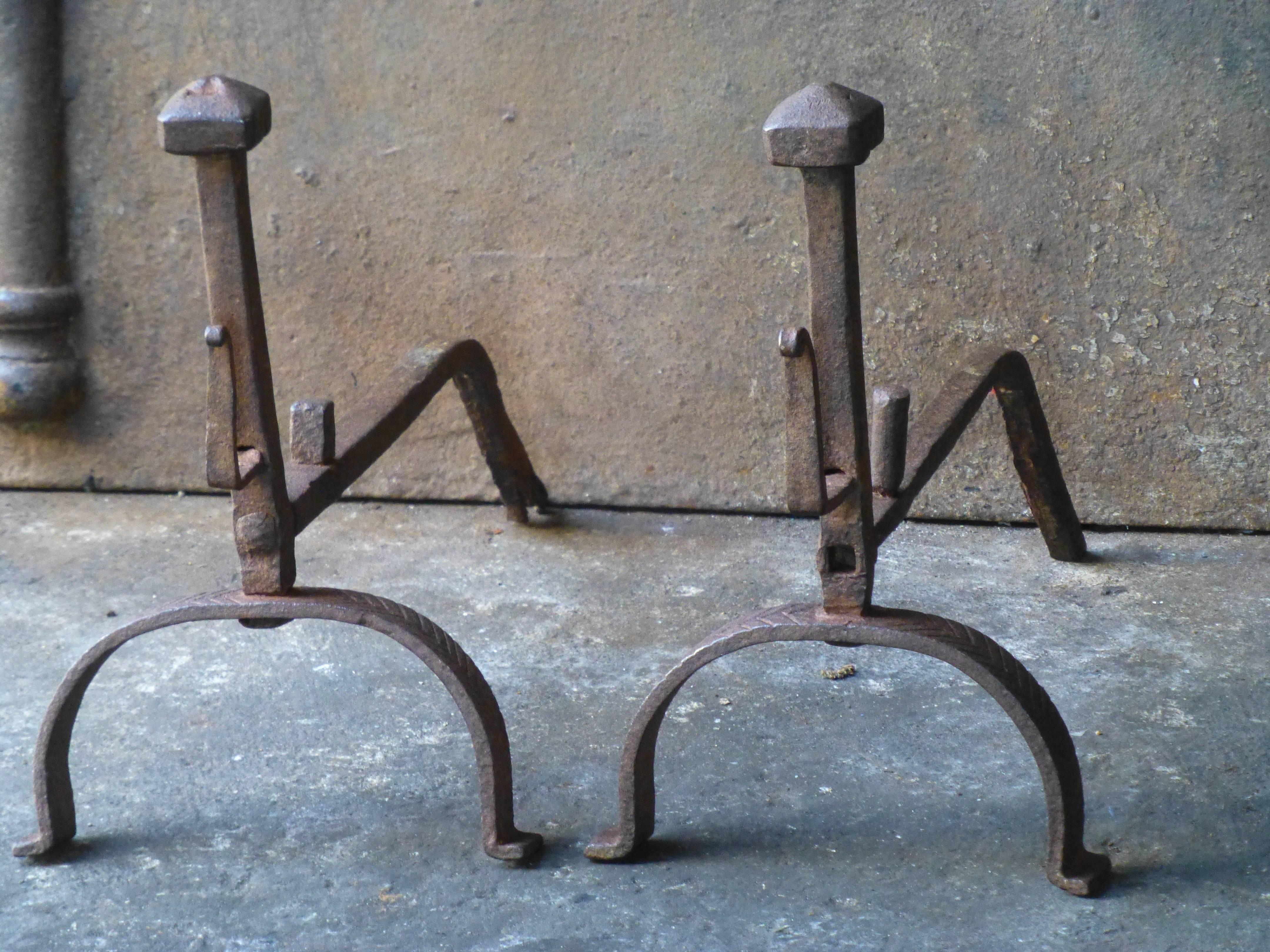 18th century French andirons made of wrought iron.