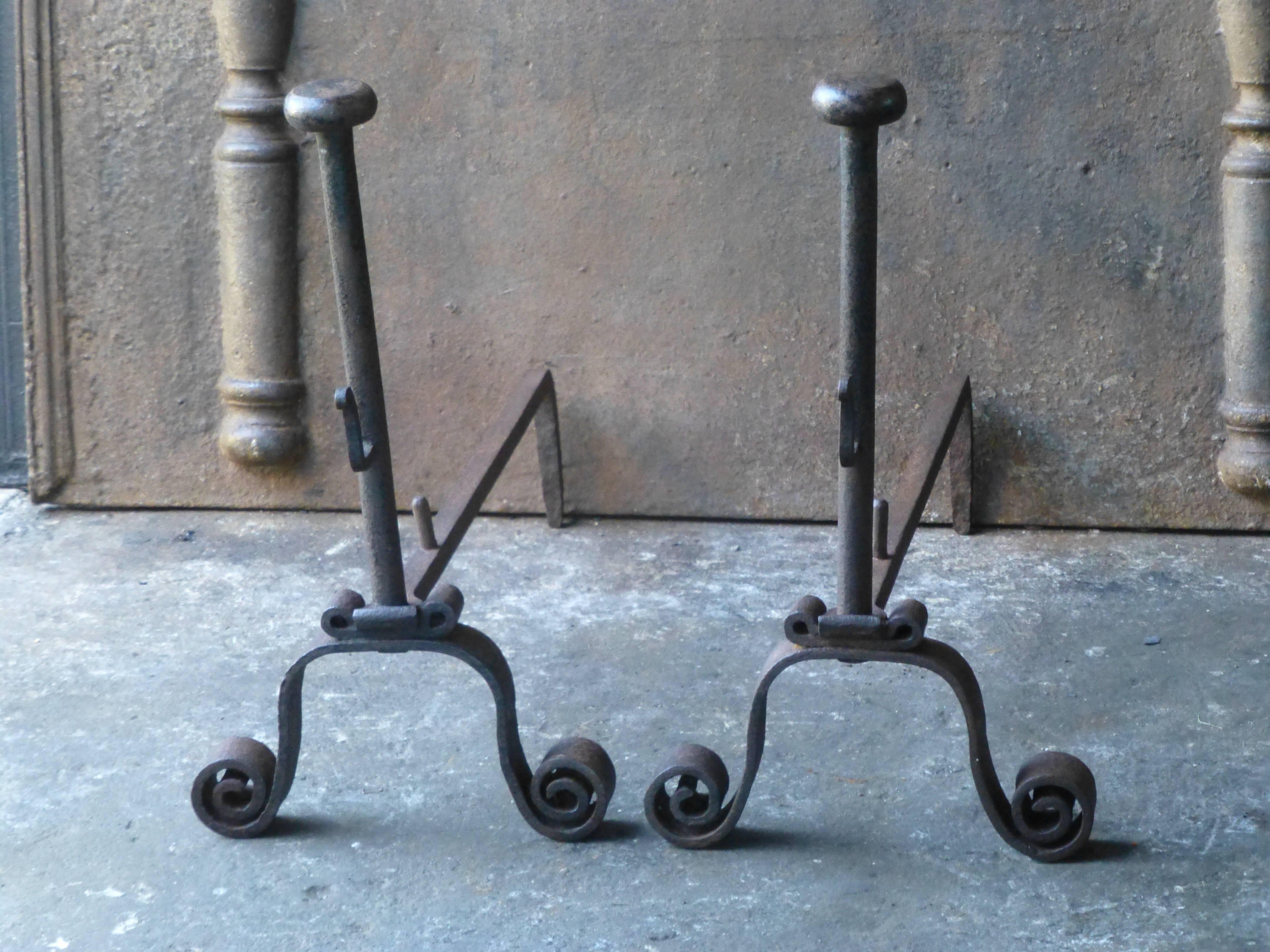 19th century Louis XV Style andirons, made of wrought iron.