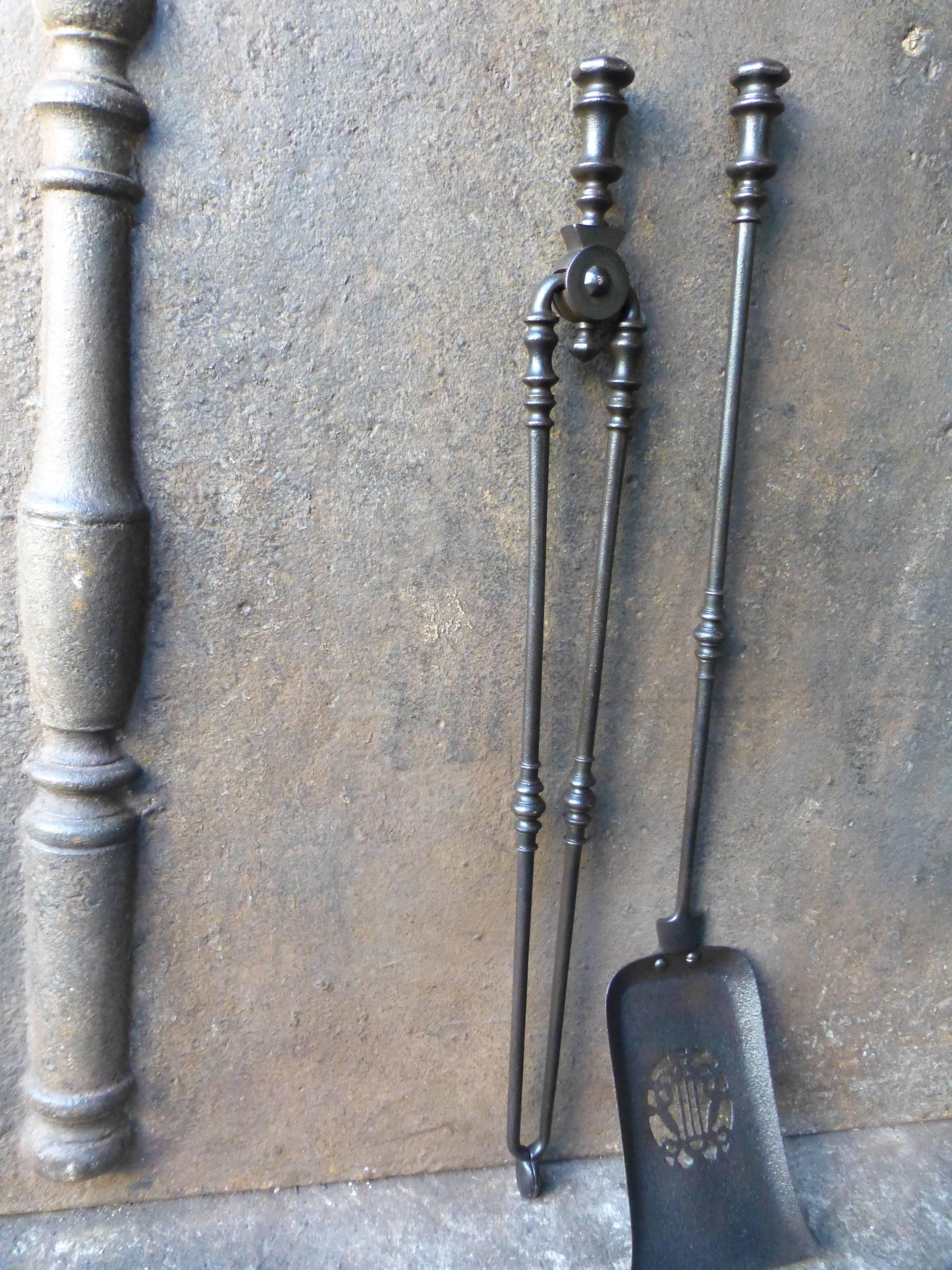 19th century English fire irons, fire tools.

We have a unique and specialized collection of antique and used fireplace accessories consisting of more than 1000 listings at 1stdibs. Amongst others we always have 300+ firebacks, 250+ pairs of