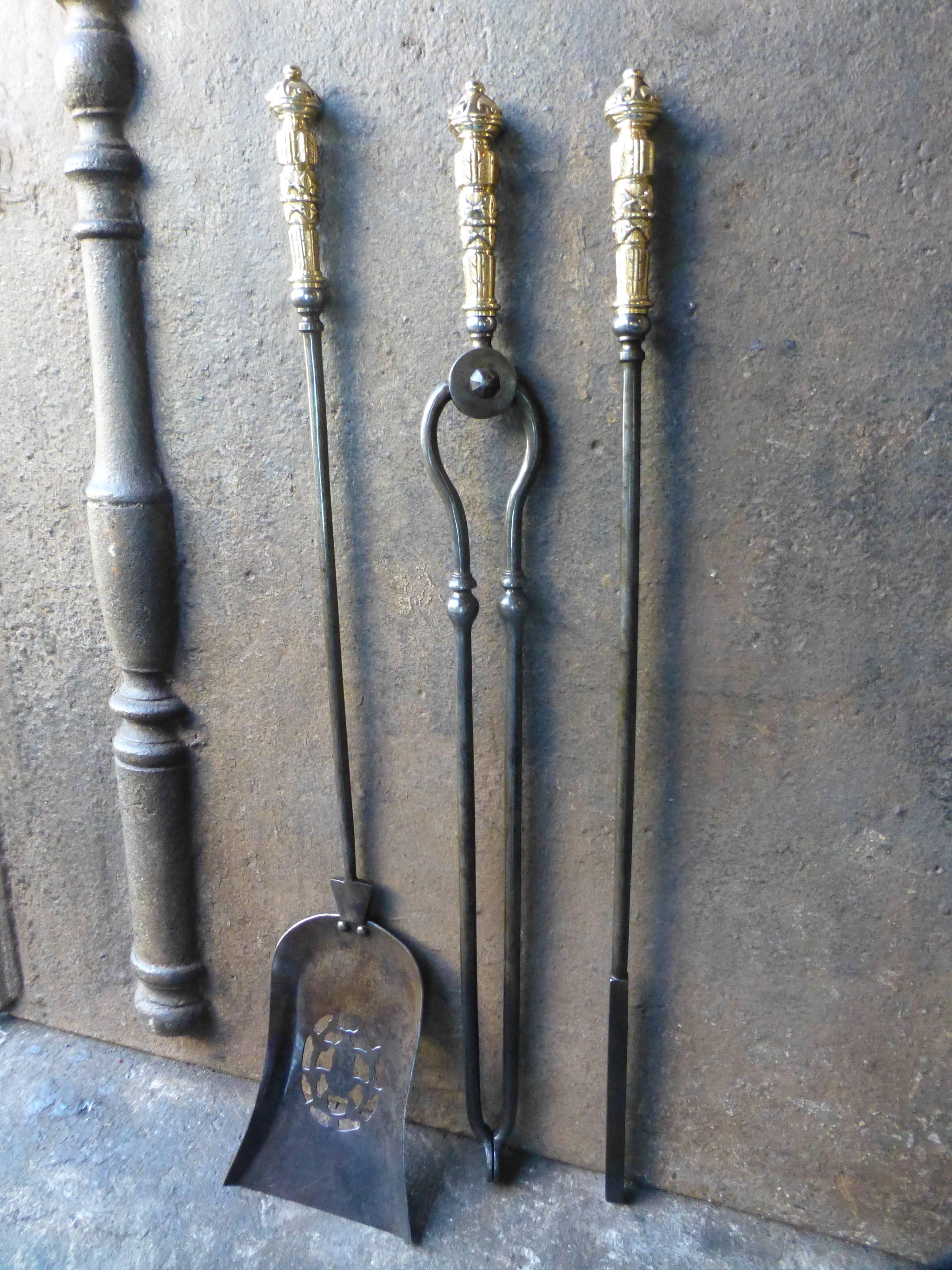 19th century English fireplace tool set.

We have a unique and specialized collection of antique and used fireplace accessories consisting of more than 1000 listings at 1stdibs. Amongst others, we always have 500+ firebacks, 400+ pairs of andirons