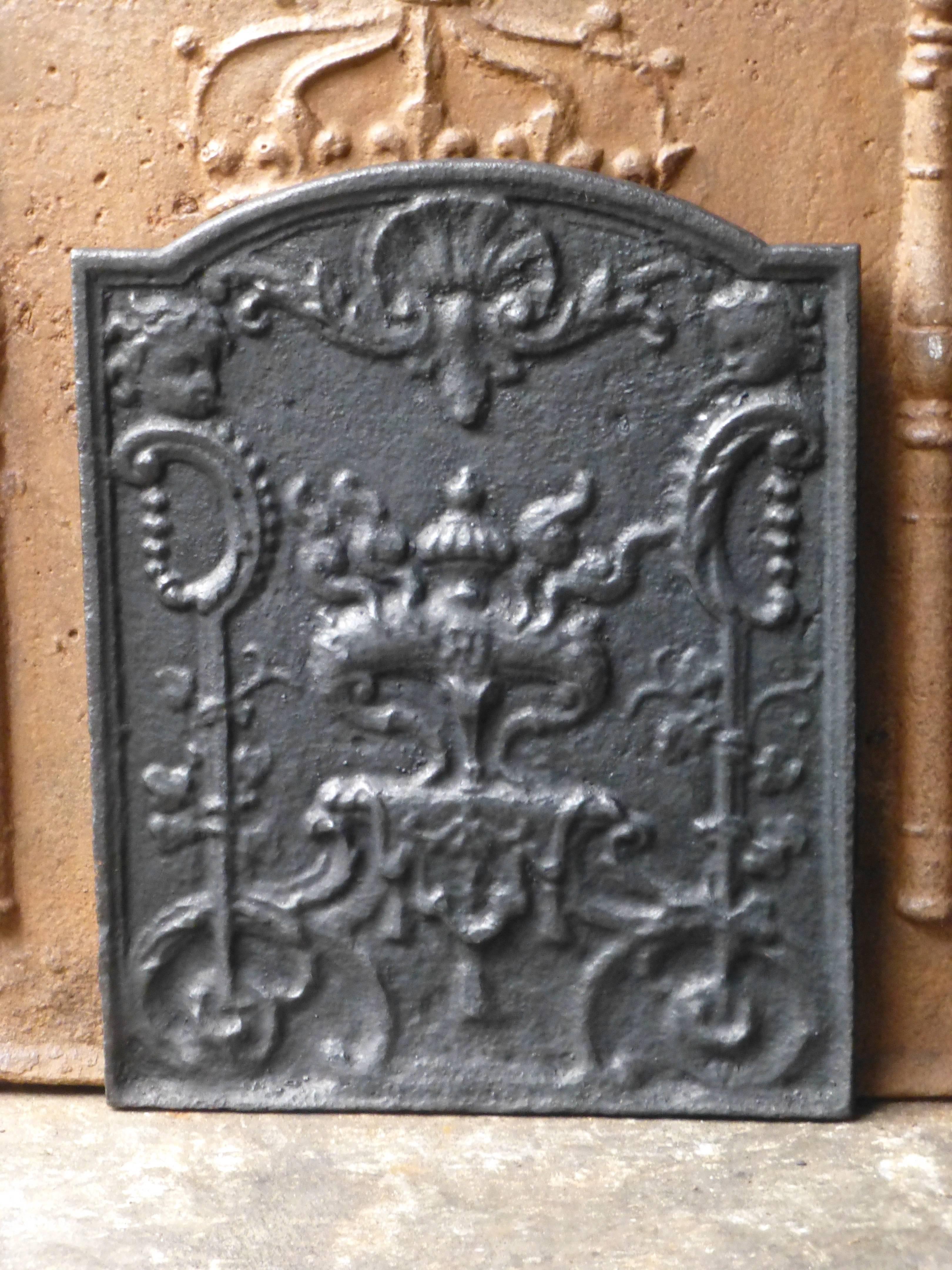 18th century French Rococo fireback with decorations.