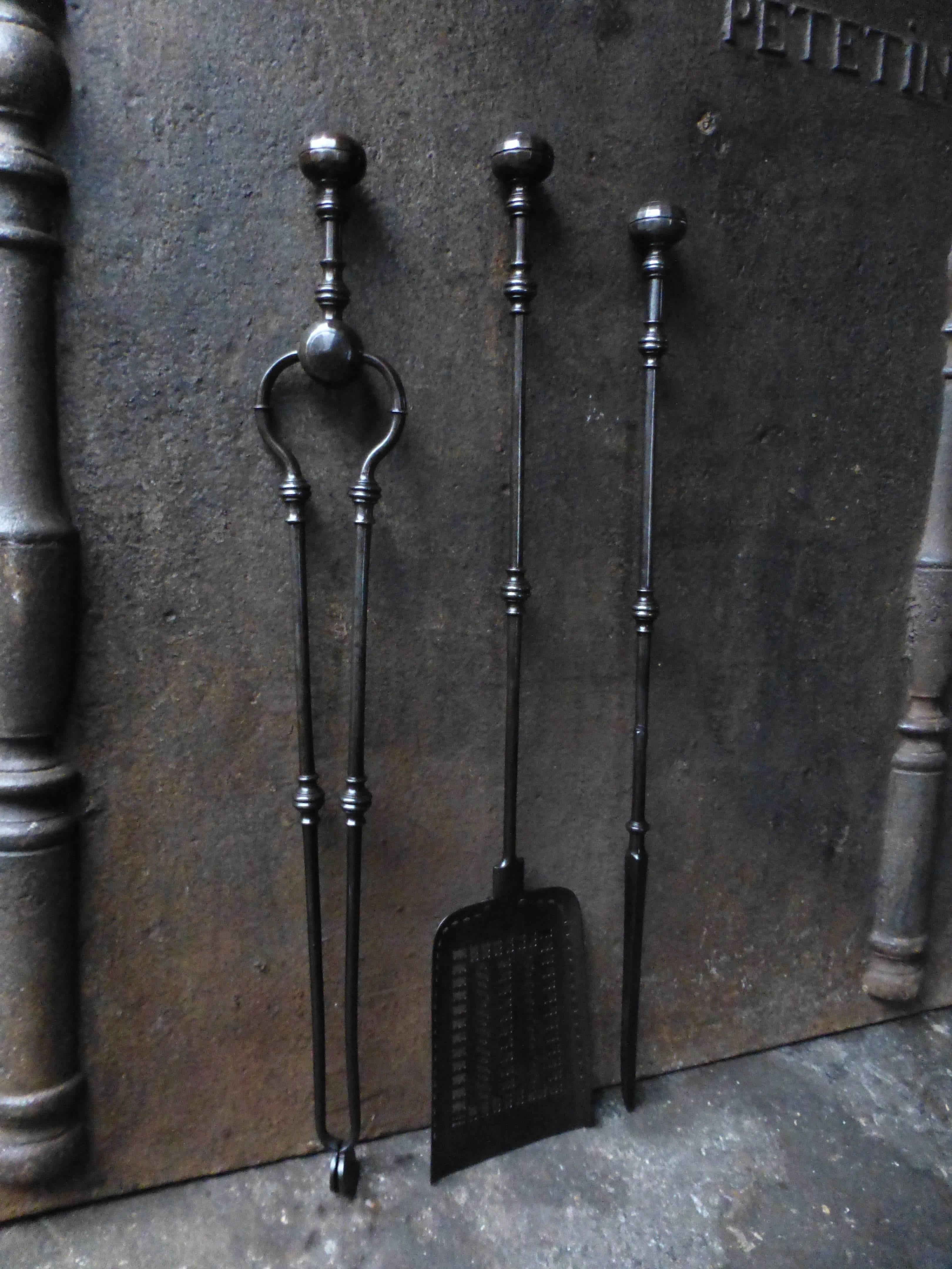 19th century English fireplace tools made of wrought iron.

We have a unique and specialized collection of antique and used fireplace accessories consisting of more than 1000 listings at 1stdibs. Amongst others, we always have 500+ firebacks, 400+