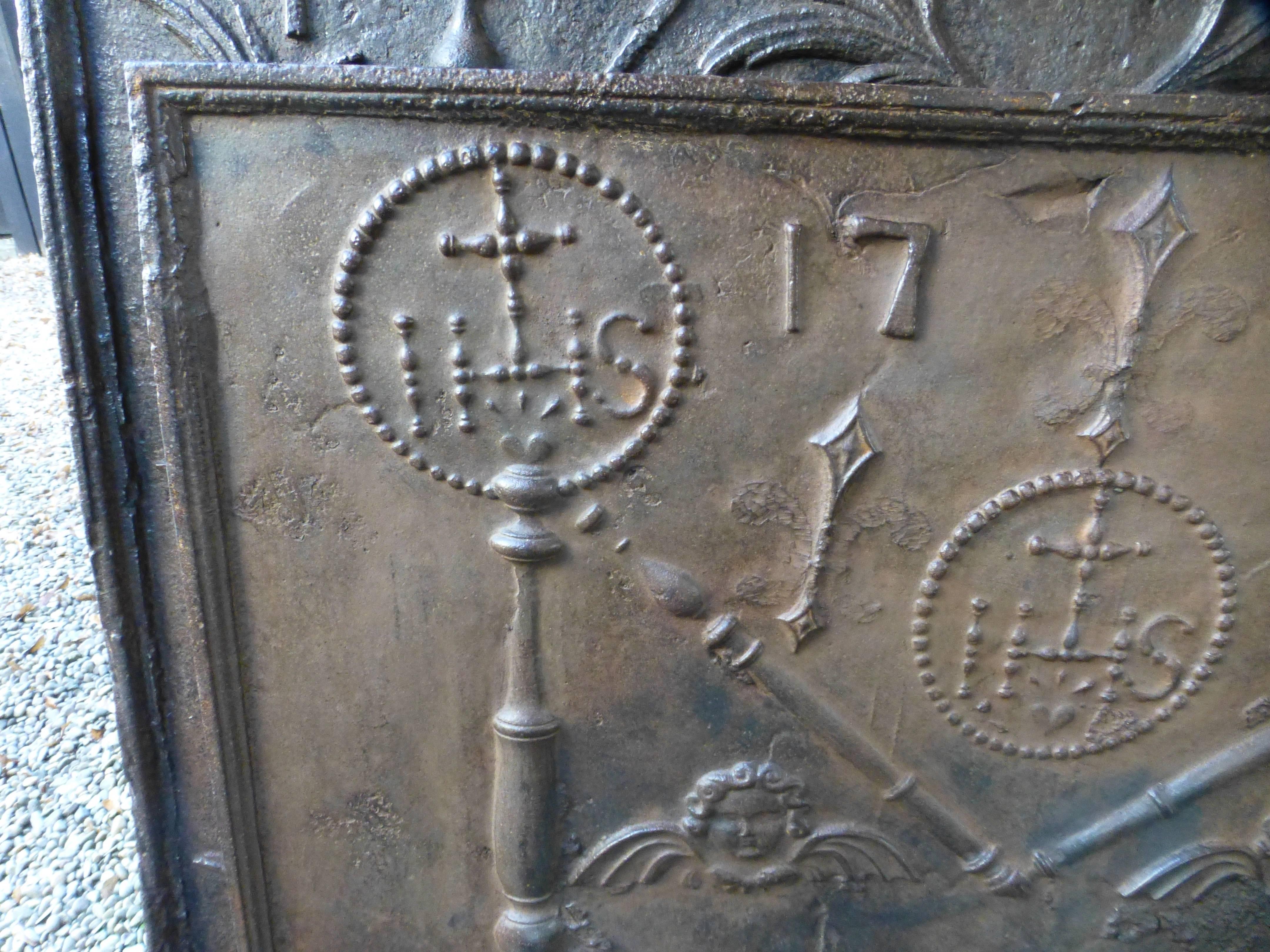 French 18th Century Pillars with Medieval IHS Monogram Fireback / Backsplash For Sale