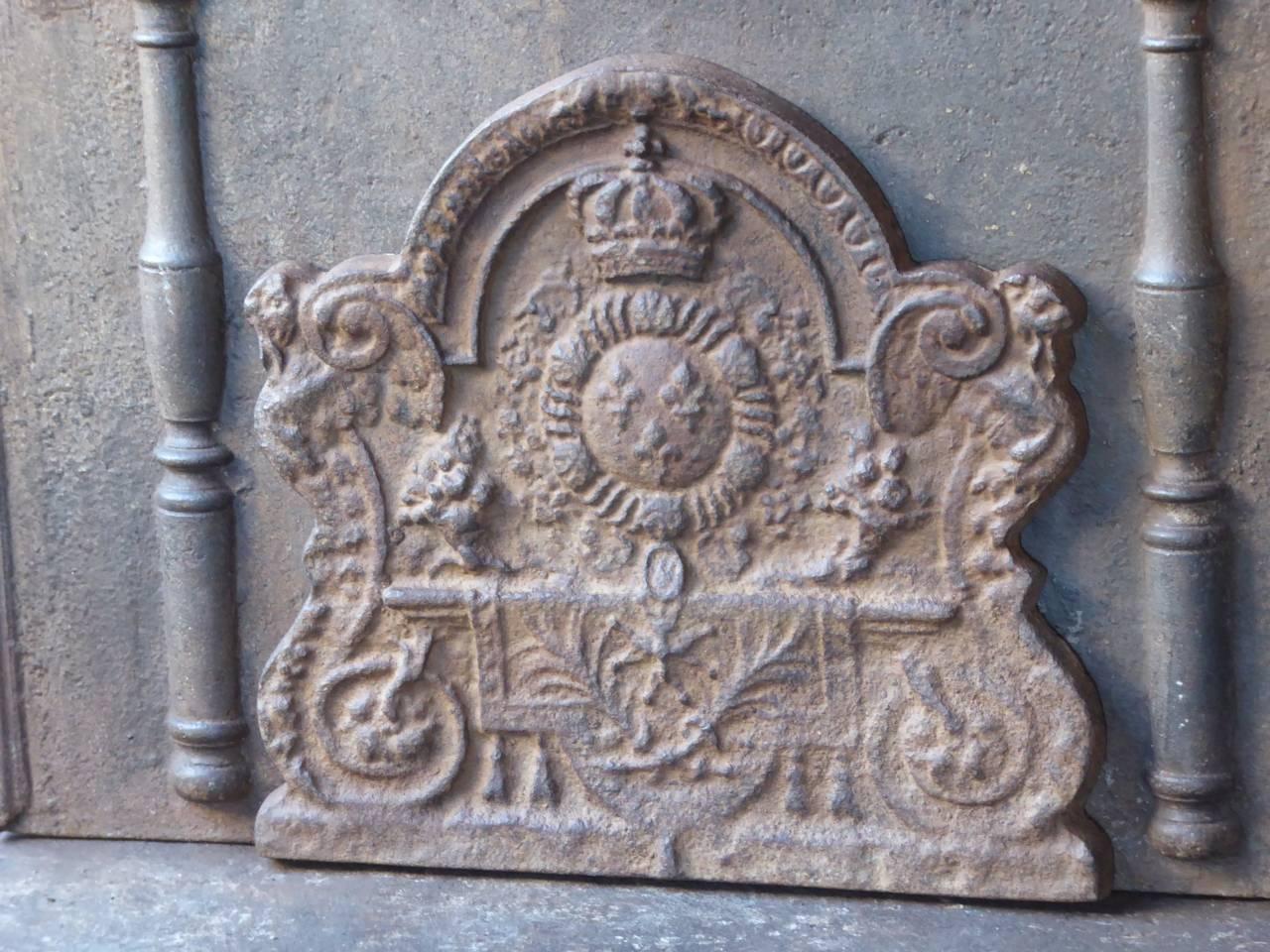 French fireback with the arms of France. Arms of the House of Bourbon, an originally French royal house that became a major dynasty in Europe. It delivered kings for Spain (Navarra), France, both Sicilies and Parma. Bourbon kings ruled France from