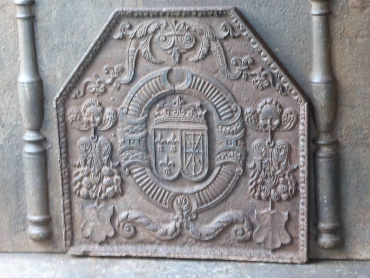 17th century French fireback with the arms of France and Navarre. 

Arms of the House of Bourbon from France, one of the major royal dynasties of Europe that produced monarchs of Spain (Navarre), France, the two Sicilies and Parma. Bourbon kings