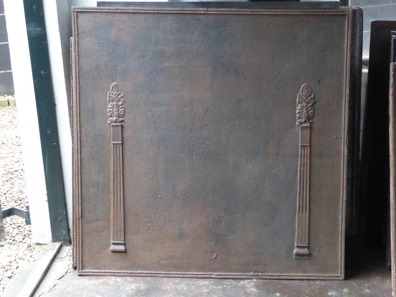 Large 19th century French fireback with two pillars.

We have a unique and specialized collection of antique and used fireplace accessories consisting of more than 1000 listings at 1stdibs. Amongst others we always have 300+ firebacks, 250+ pairs of