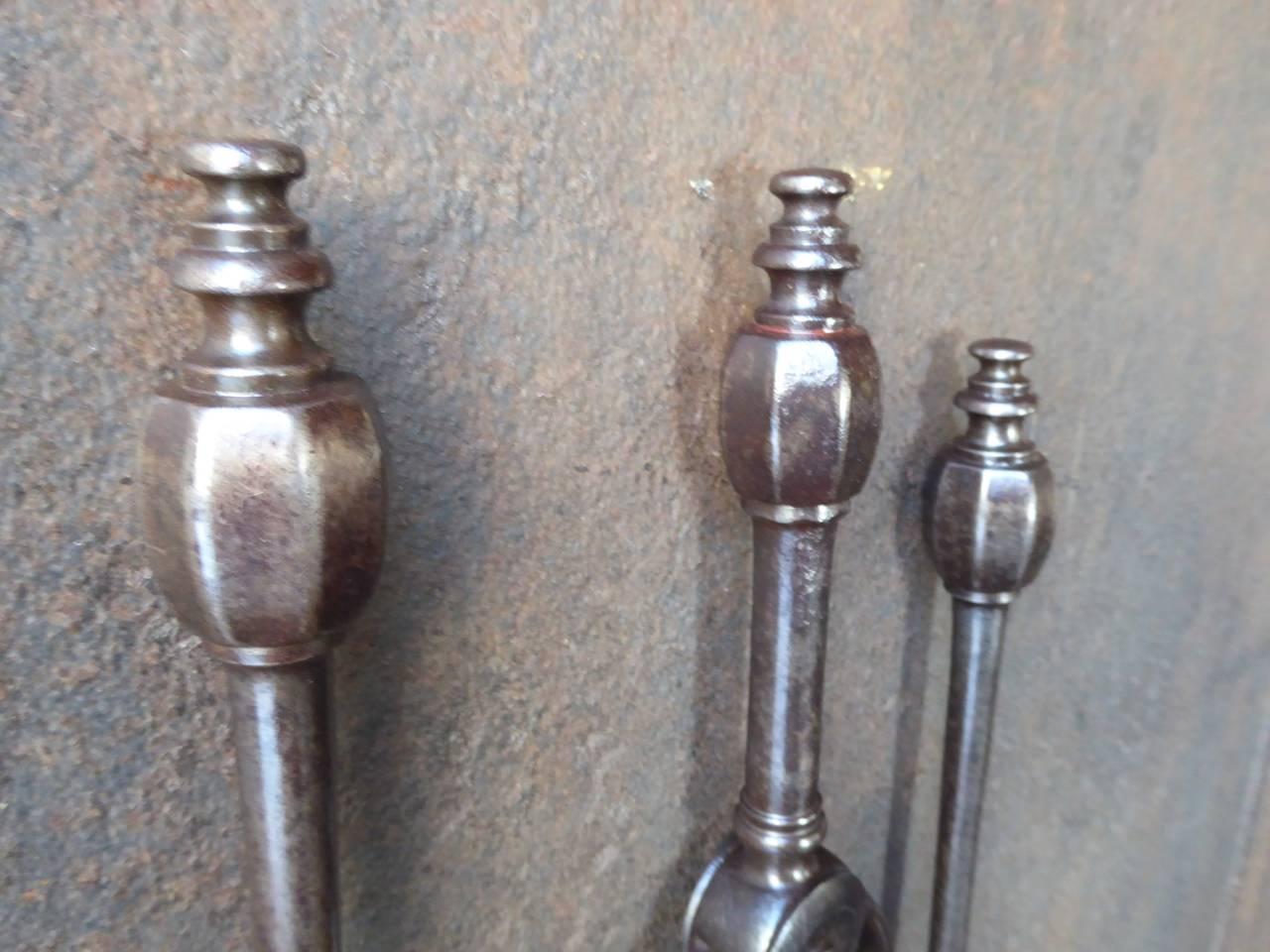 19th century English fireplace tools, fire irons made of wrought iron, polished copper and bronze.

We have a unique and specialized collection of antique and used fireplace accessories consisting of more than 1000 listings at 1stdibs. Amongst