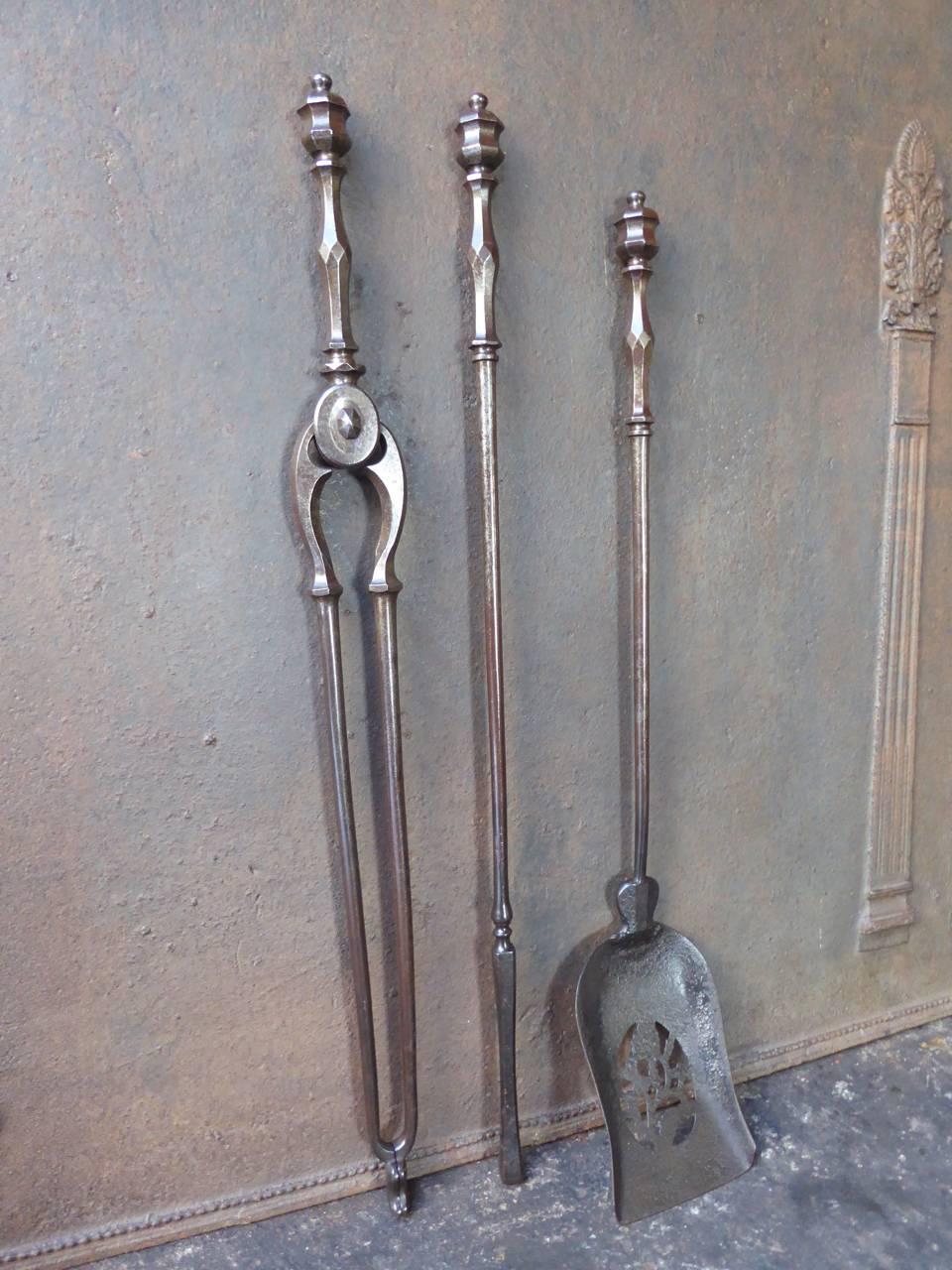 19th century English fireplace tools, fire irons made of wrought iron.

We have a unique and specialized collection of antique and used fireplace accessories consisting of more than 1000 listings at 1stdibs. Amongst others, we always have 500+