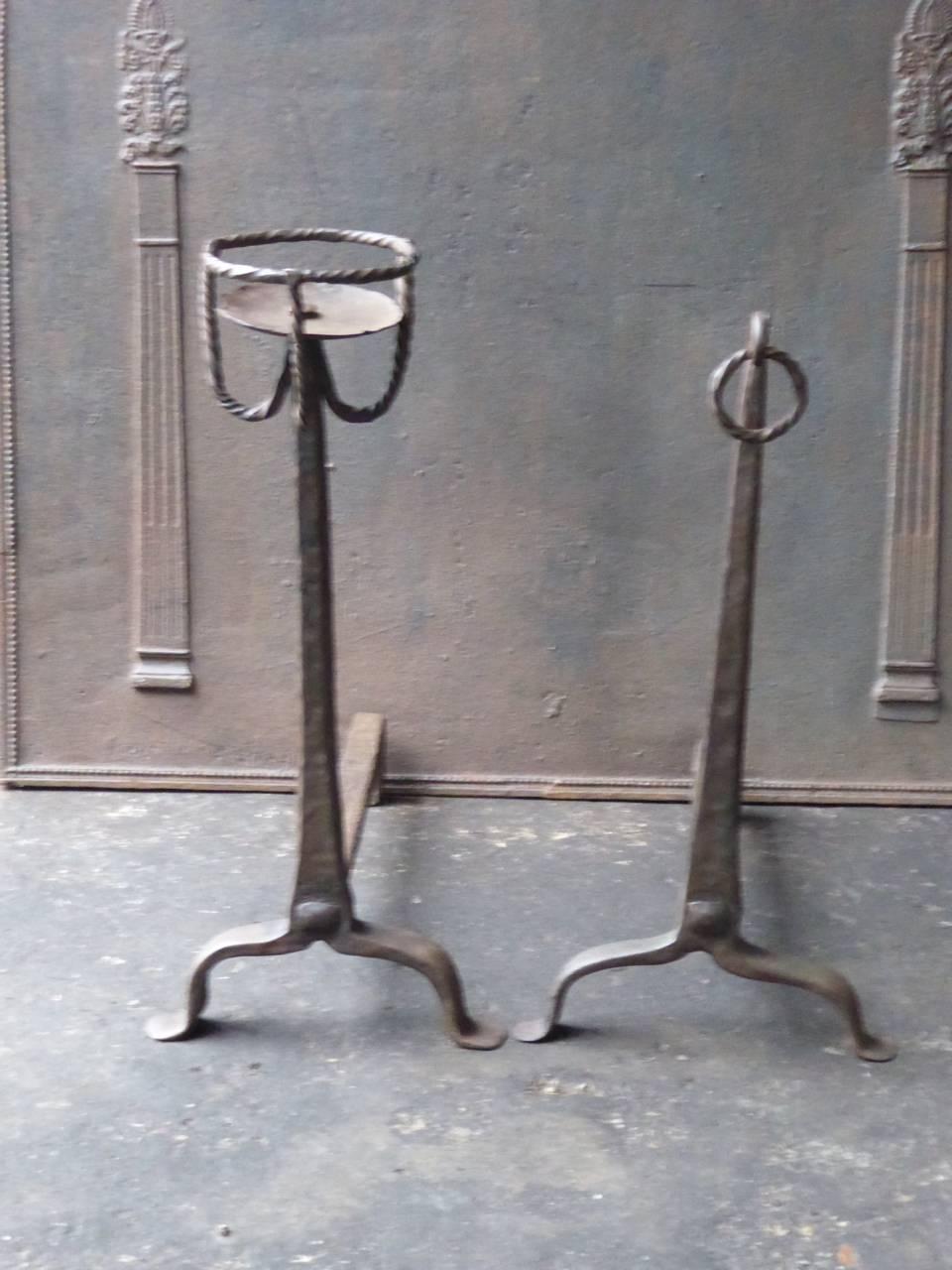 17th-18th century French Gothic fire dogs made of wrought iron. The condition is good.