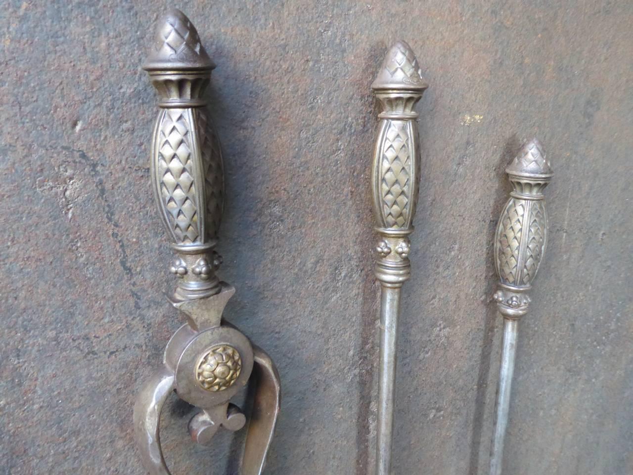 English Art Nouveau fireplace tools made of wrought iron and brass.

We have a unique and specialized collection of antique and used fireplace accessories consisting of more than 1000 listings at 1stdibs. Amongst others, we always have 500+