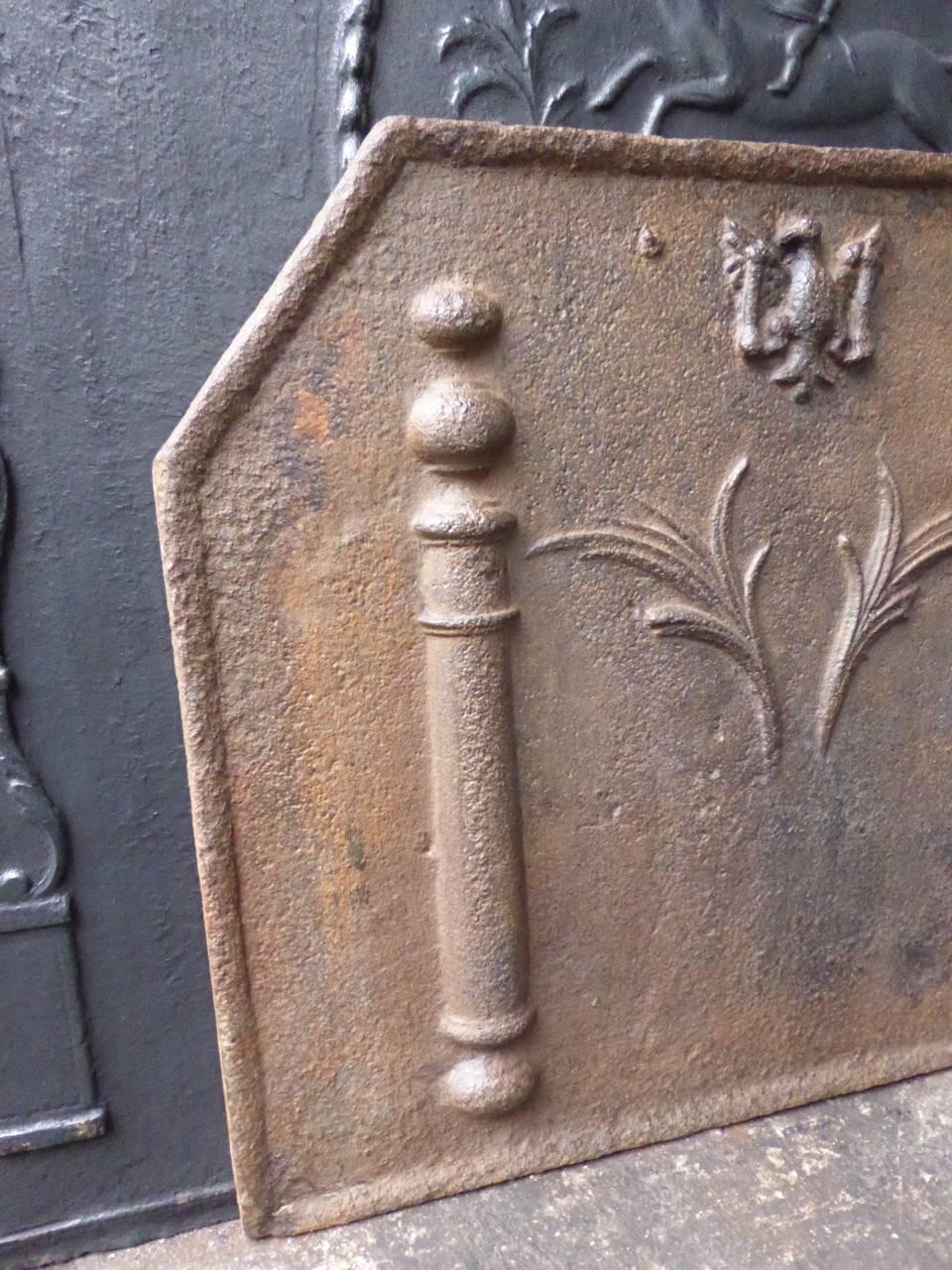 18th century French fireback with pillars and decoration.