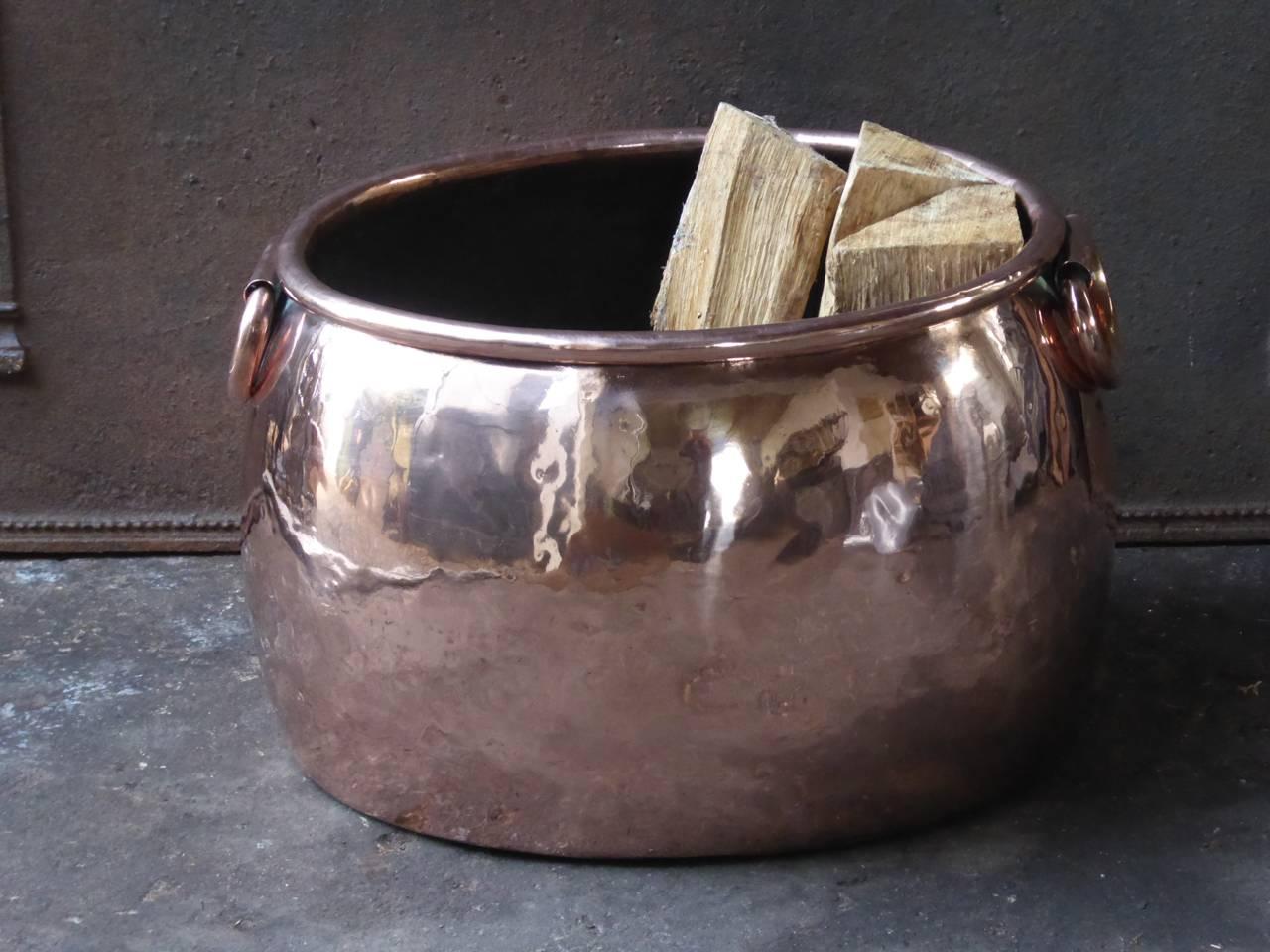 18th century English log bin - firewood holder made of polished copper.