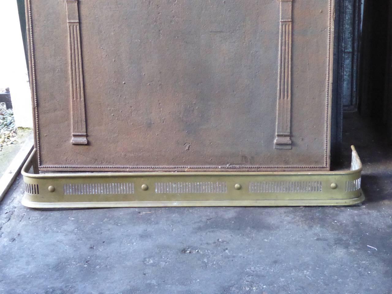 19th-20th century English fireplace fender, fire screen made of brass.