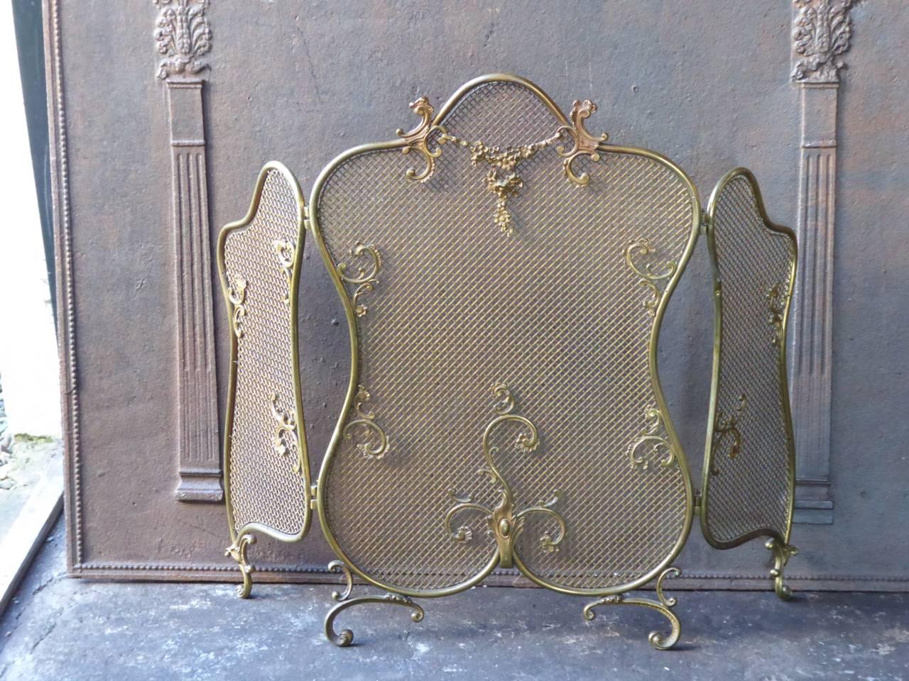 19th century French fireplace screen made of brass.