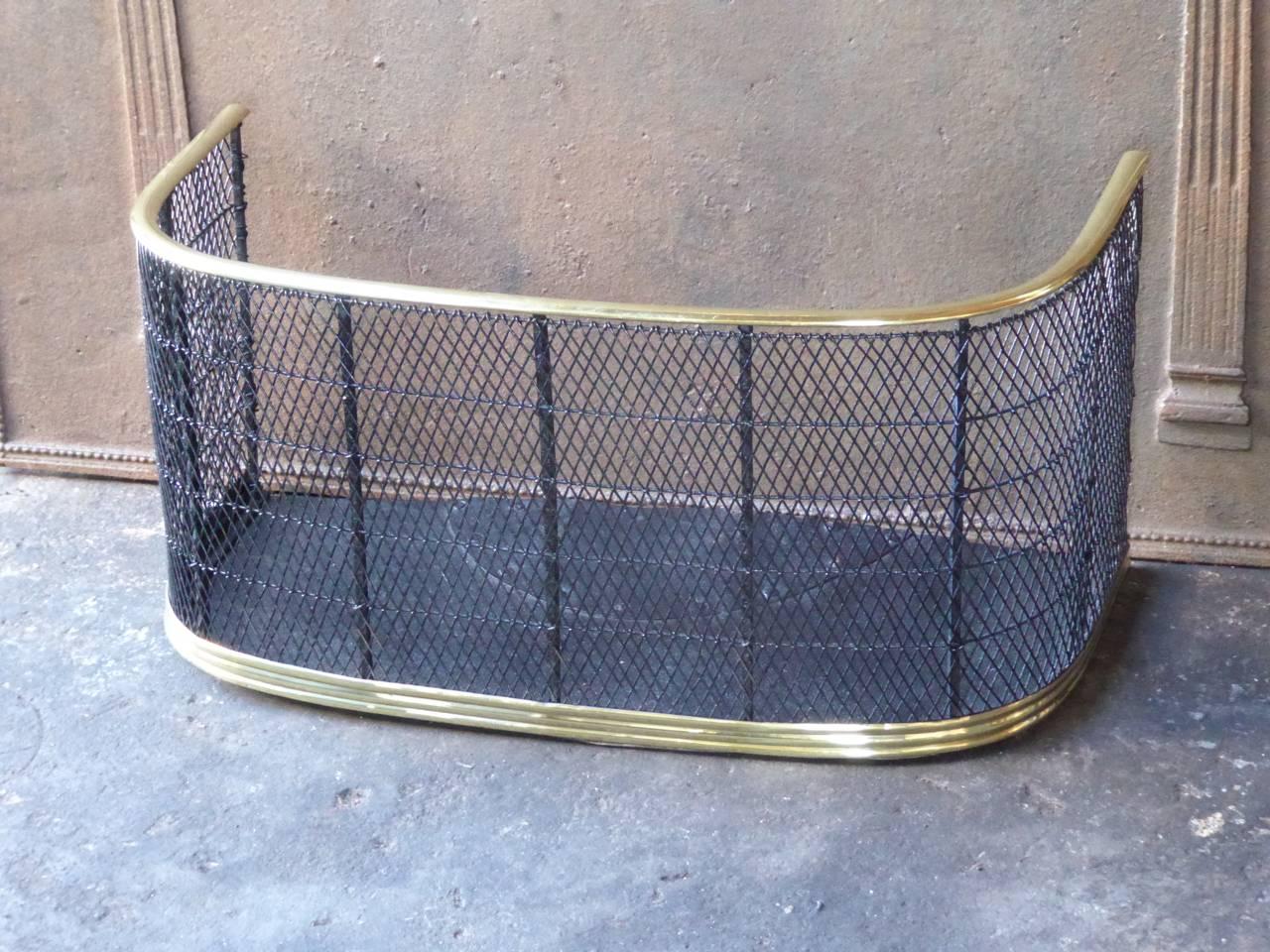 19th century English fireplace guard, fire screen made of polished brass, iron and iron mesh.