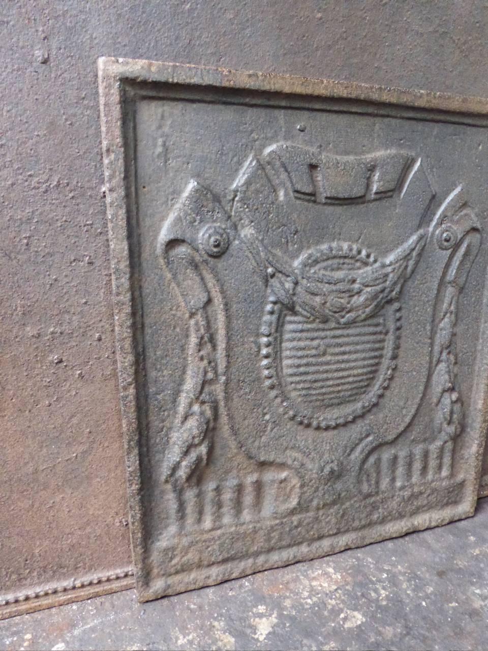 French fireback with a coat of arms.