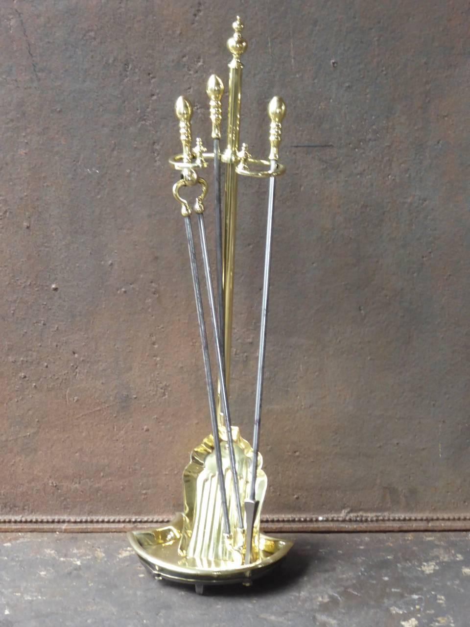 19th century English fireplace tool set - fire irons made of polished brass and polished steel.
