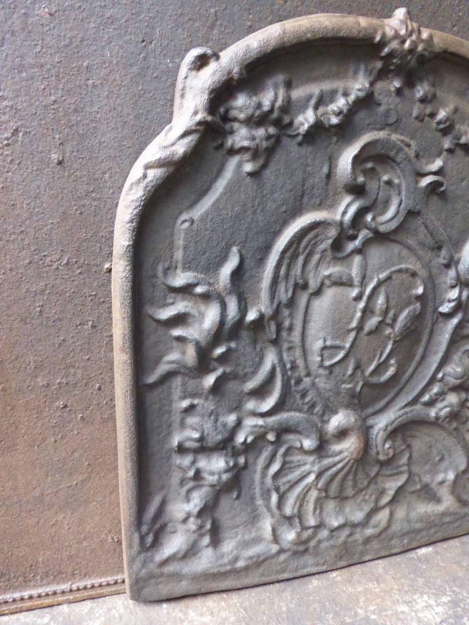 French fireback with Rococo style decoration.