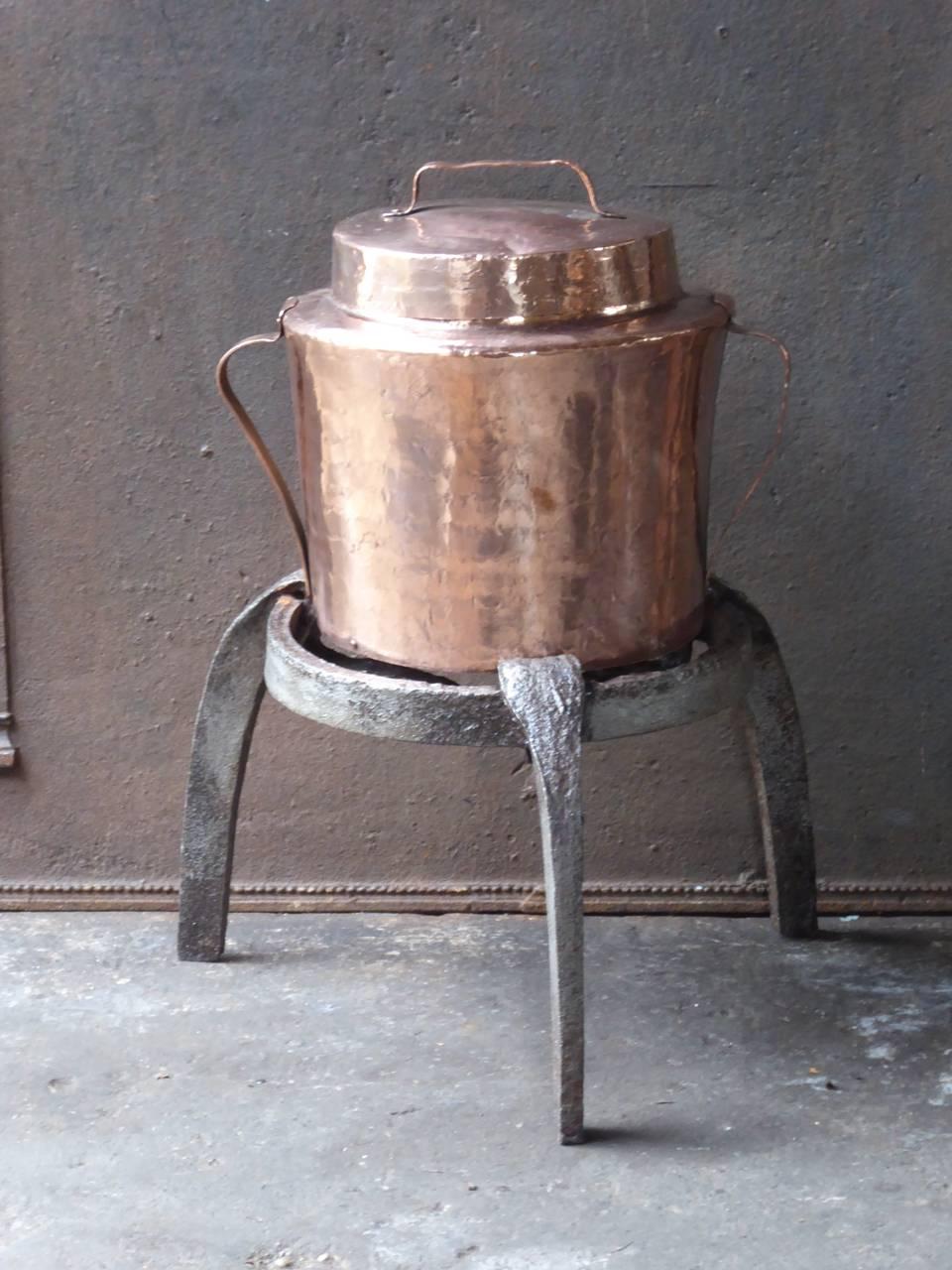 18th century, French trivet made from wrought iron with its matching water cooker made from polished copper.

We have a unique and specialized collection of antique and used fireplace accessories consisting of more than 1000 listings at 1stdibs.