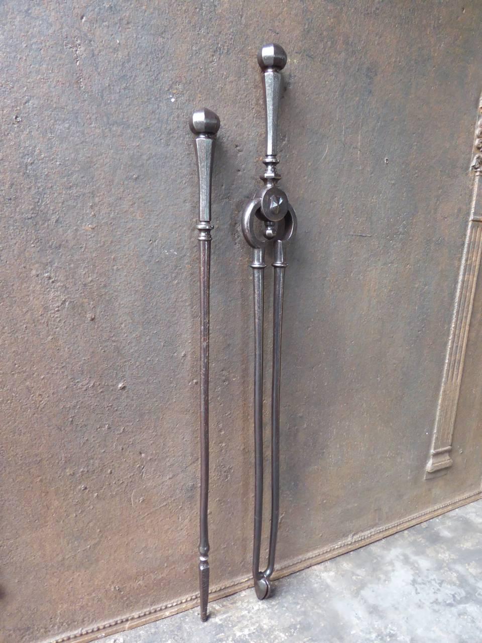 19th century English fireplace tool set, fire irons made of wrought iron.

We have a unique and specialized collection of antique and used fireplace accessories consisting of more than 1000 listings at 1stdibs. Amongst others, we always have 300+