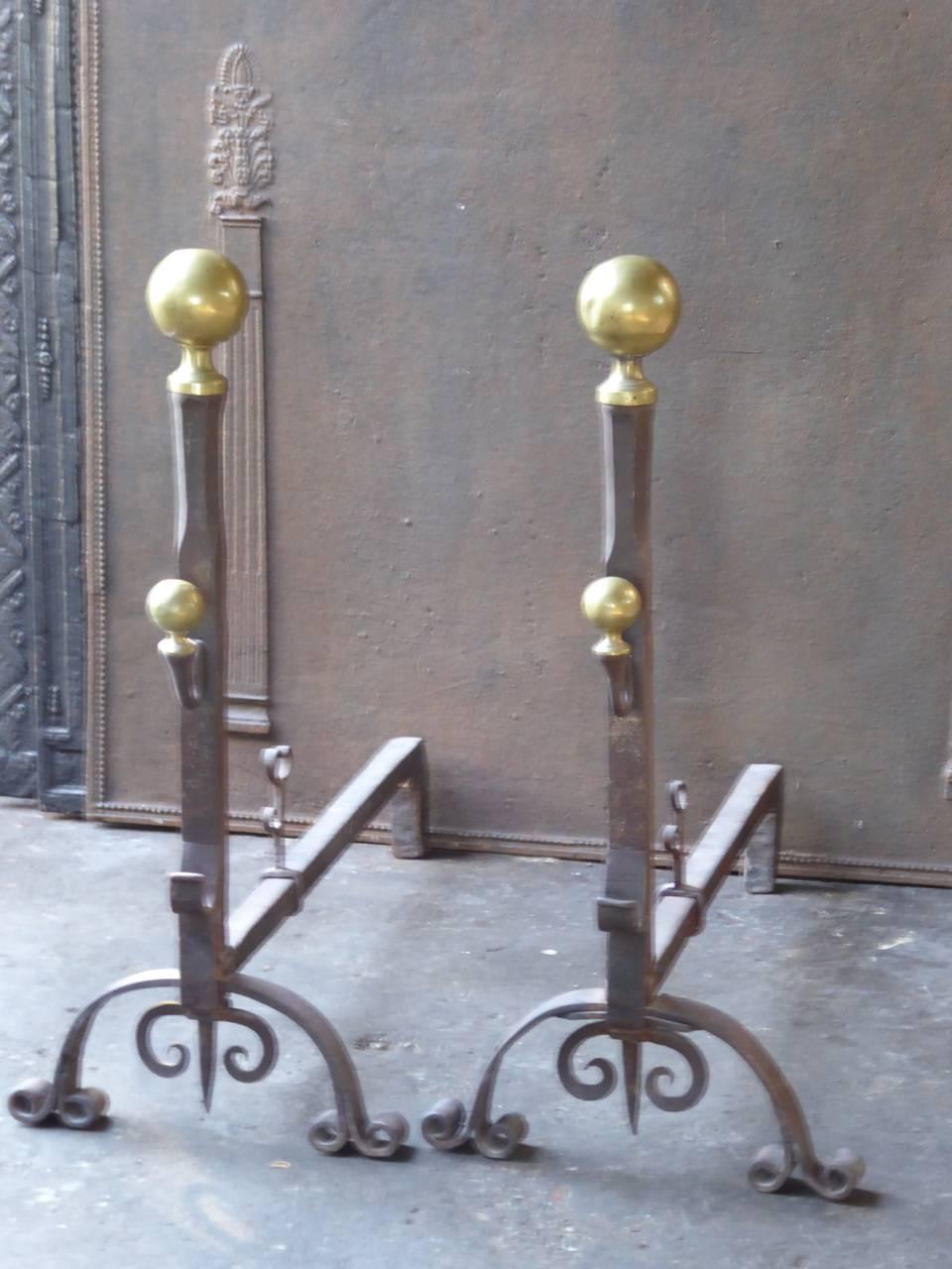 19th century French firedogs made of wrought iron and brass.

This product has to be shipped as freight due to its size and/or (volumetric) weight. You can contact us to find out the daily rate for a freight shipment of this product to your
