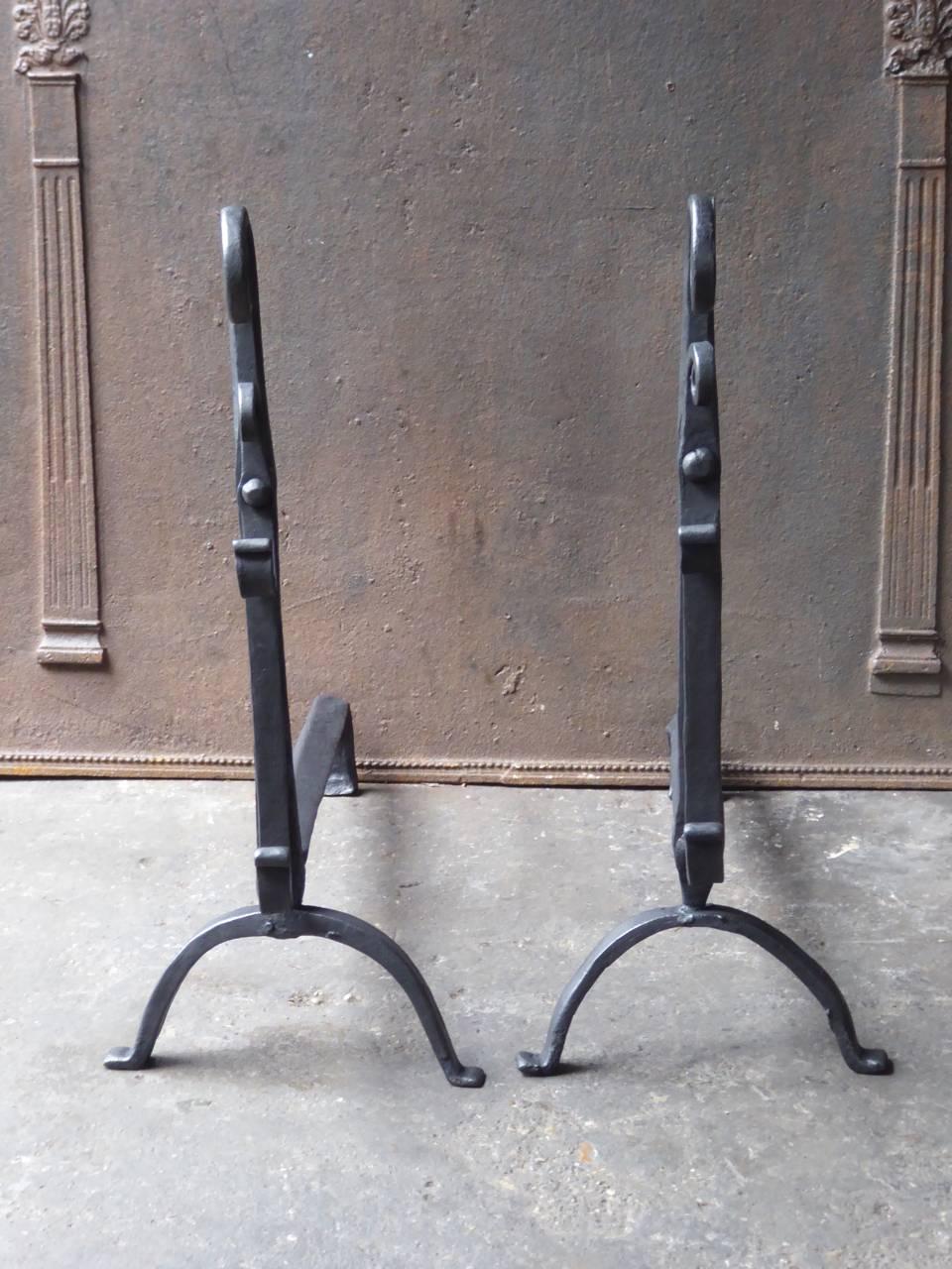 17th-18th century, French Gothic style fire dogs made of wrought iron.