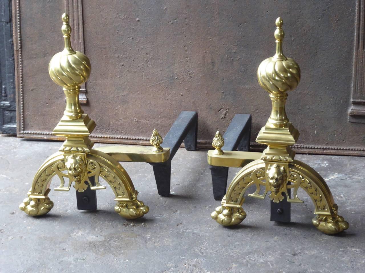 French Louis XIV style andirons made of polished brass and cast iron.

We have a unique and specialized collection of antique and used fireplace accessories consisting of more than 1000 listings at 1stdibs. Amongst others, we always have 300+