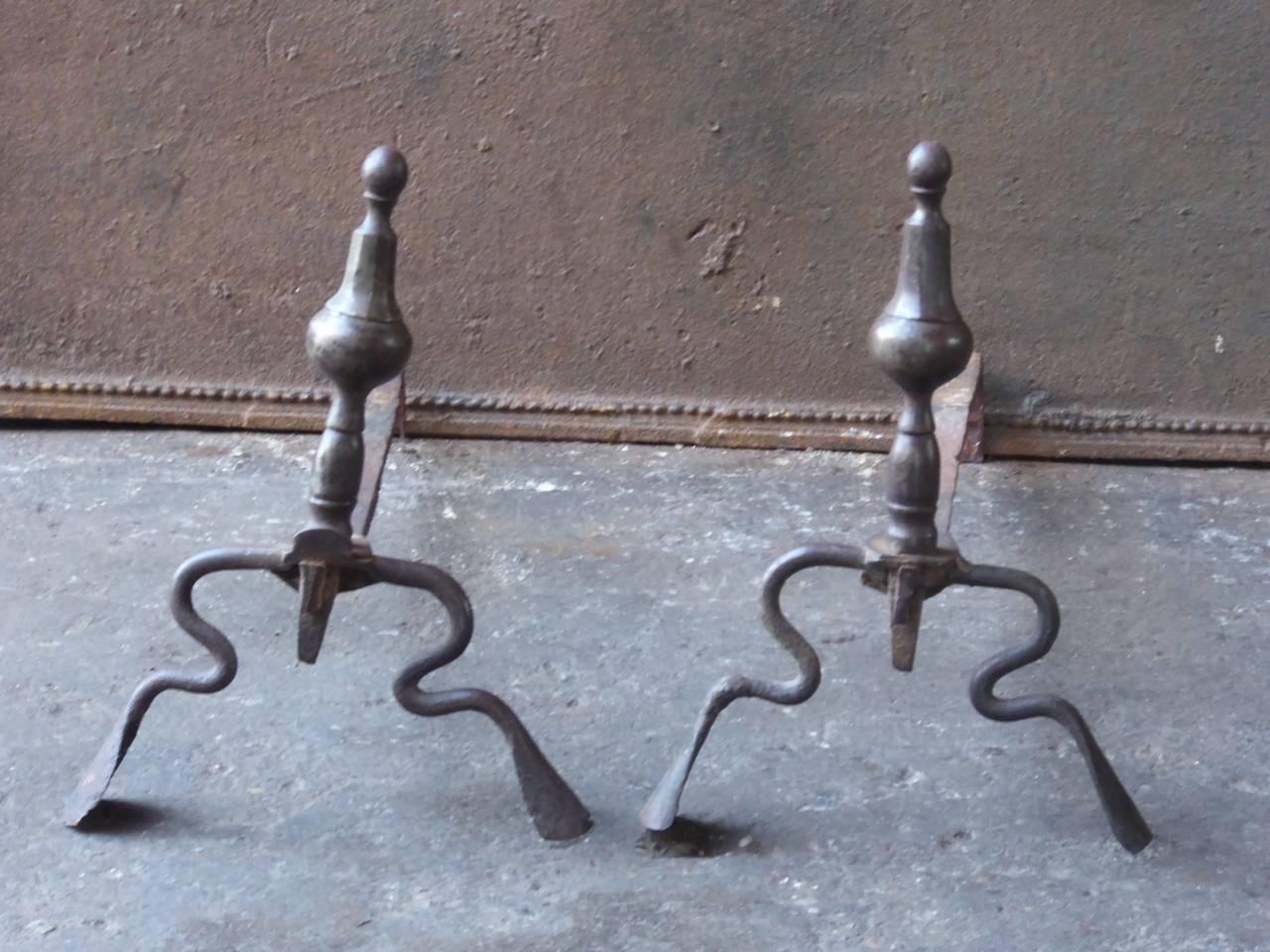 18th century French Louis XIV style firedogs made of wrought iron.

We have a unique and specialized collection of antique and used fireplace accessories consisting of more than 1000 listings at 1stdibs. Amongst others, we always have 500+