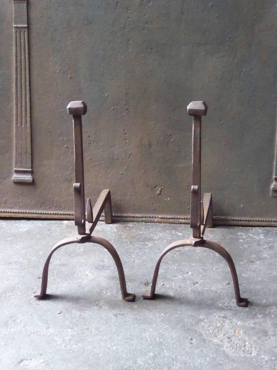 19th century, French Napoleon III period fire dogs made of wrought iron. The andirons have spit hooks to grill food. The condition is good.


