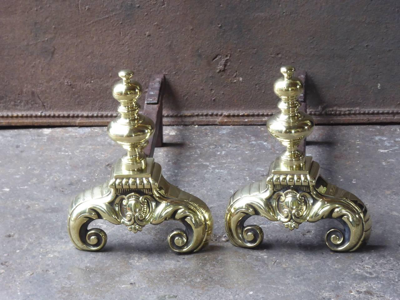 18th century Louis XV andirons made of polished brass and wrought iron.

We have a unique and specialized collection of antique and used fireplace accessories consisting of more than 1000 listings at 1stdibs. Amongst others, we always have 300+