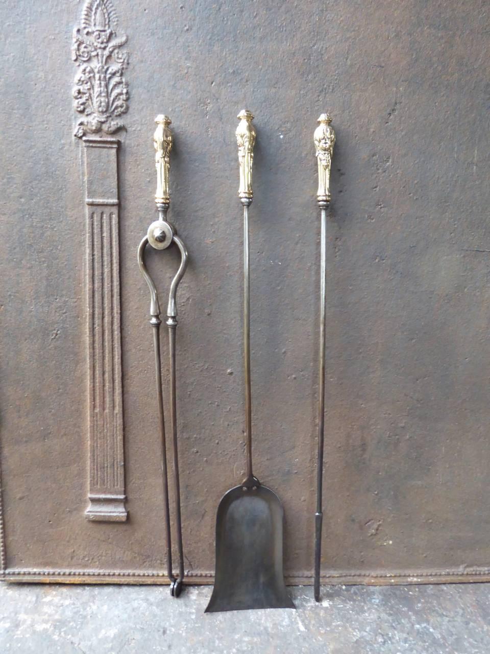 19th century English fireplace toolset made of wrought iron and polished brass.

We have a unique and specialized collection of antique and used fireplace accessories consisting of more than 1000 listings at 1stdibs. Amongst others, we always have