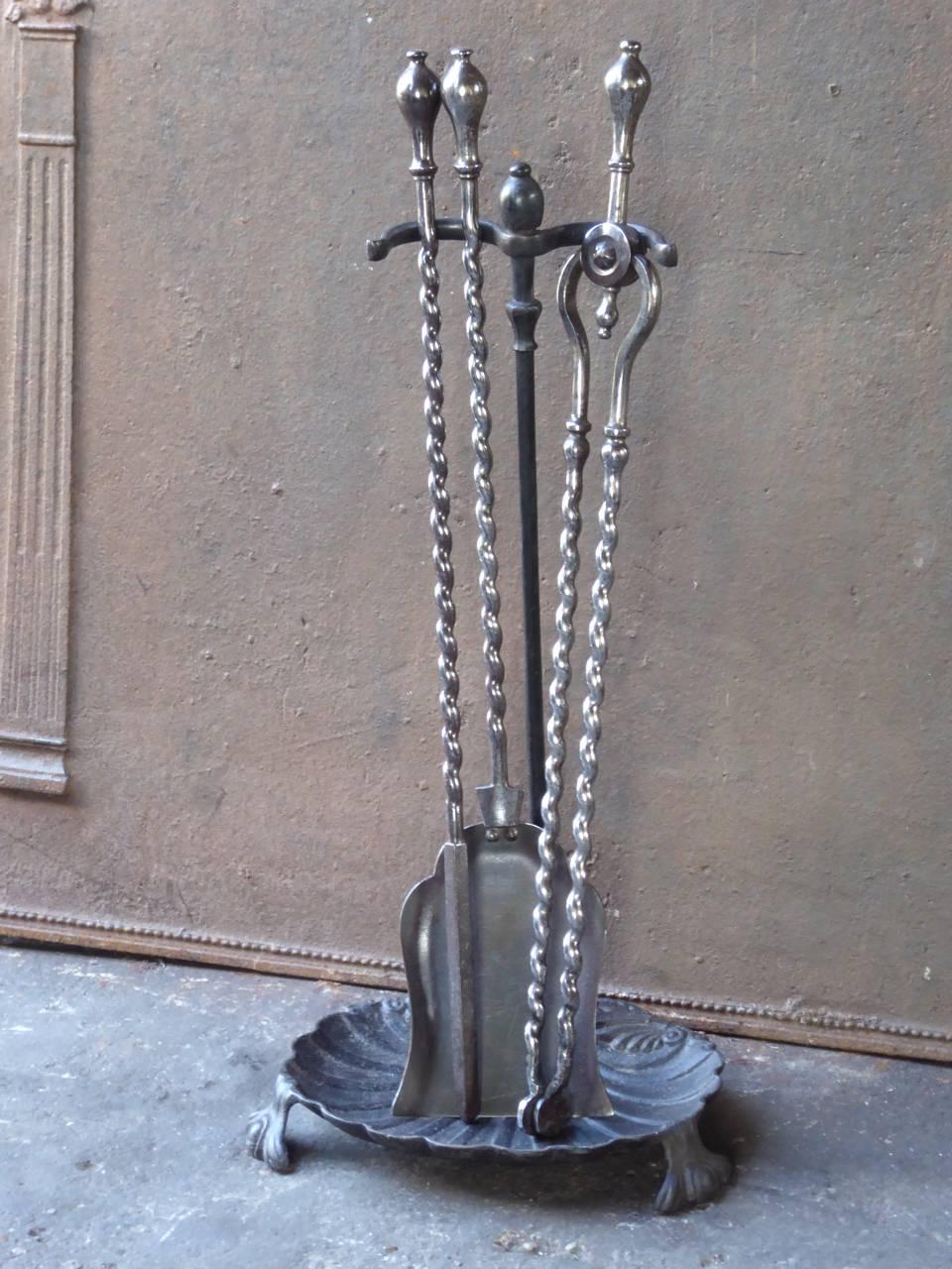 19th century English fireplace tool set, fire irons made of polished steel, wrought iron and cast iron.

We have a unique and specialized collection of antique and used fireplace accessories consisting of more than 1000 listings at 1stdibs. Amongst