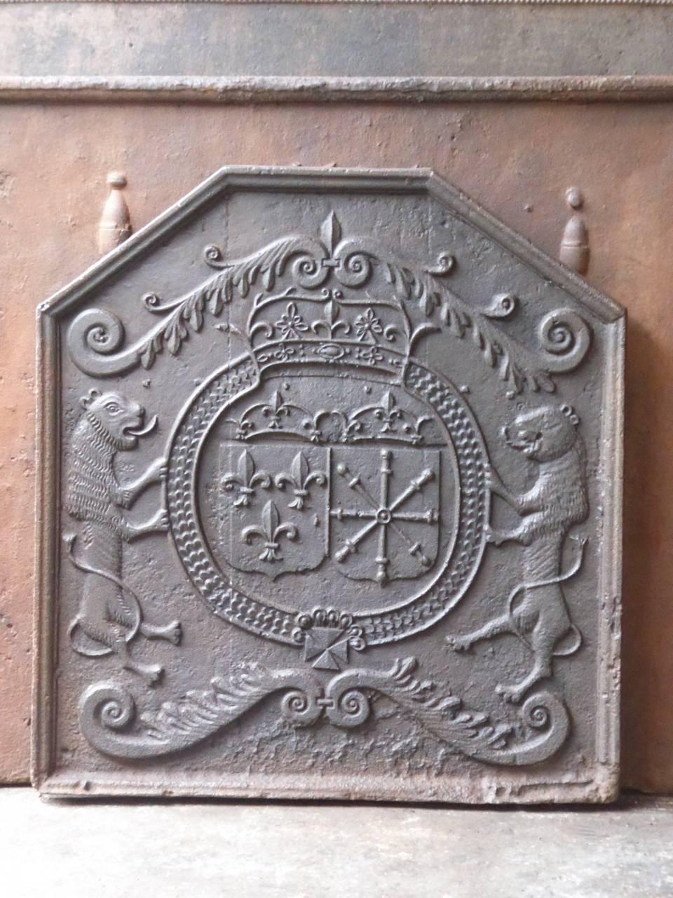 17th century French fireback with the arms of France and Navarre.

Arms of the House of Bourbon from France, one of the major royal dynasties of Europe that produced monarchs Spain (Navarre), France, the two Sicilies and Parma. Bourbon kings ruled