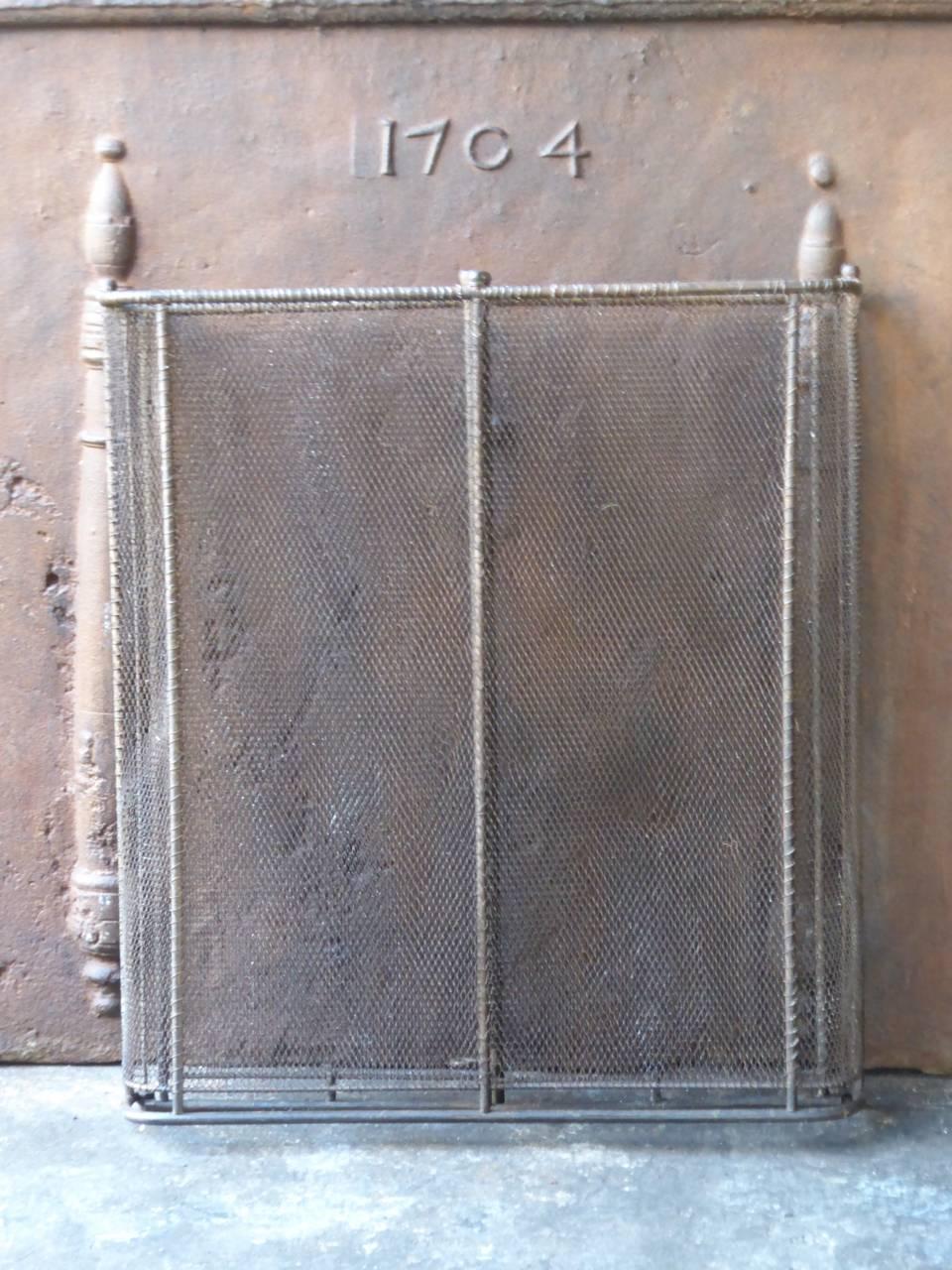 19th century French fire screen - firescreen made of wrought iron and iron mesh.

We have a unique and specialized collection of antique and used fireplace accessories consisting of more than 1000 listings at 1stdibs. Amongst others we always have