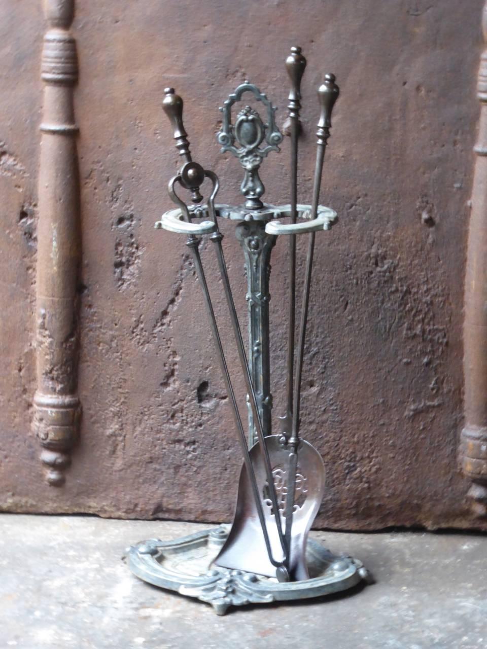 19th century English fireplace tool set - fire irons made of cast iron and wrought iron.

We have a unique and specialized collection of antique and used fireplace accessories consisting of more than 1000 listings at 1stdibs. Amongst others, we