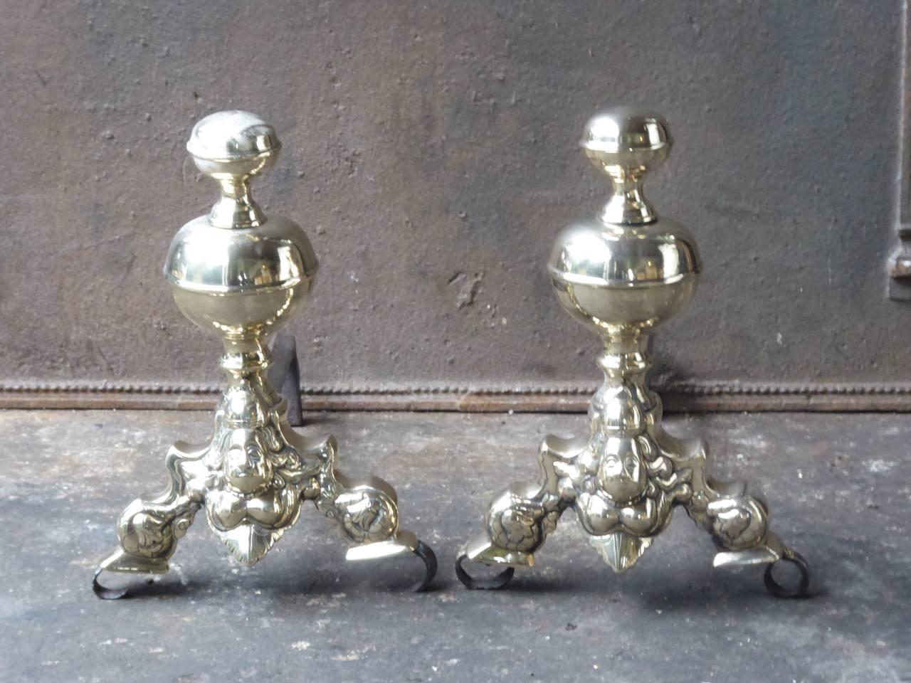 17th century Louis XIV fire dogs made of polished brass and wrought iron.

We have a unique and specialized collection of antique and used fireplace accessories consisting of more than 1000 listings at 1stdibs. Amongst others, we always have 300+