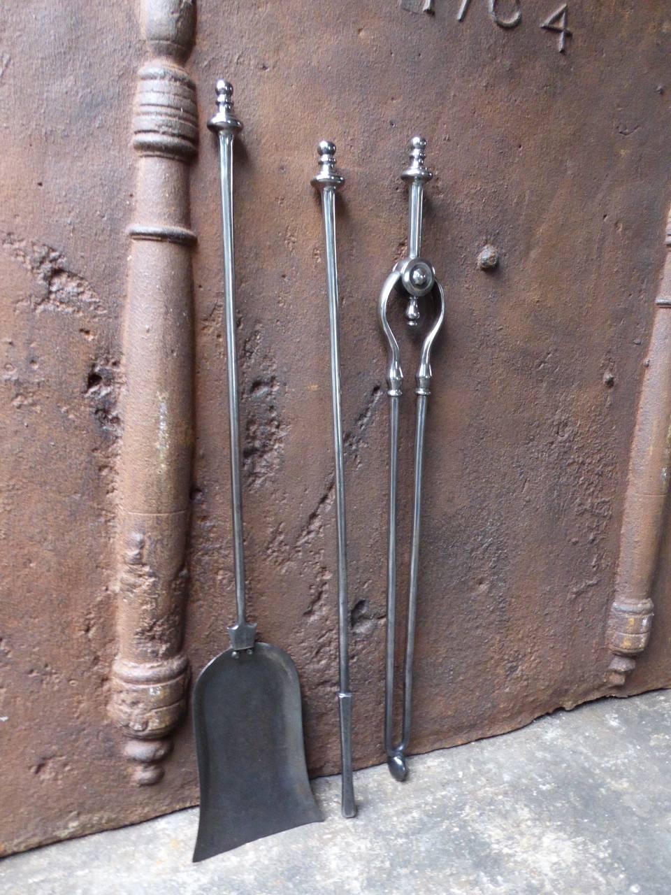 19th century English fireplace tool set fire irons made of polished steel.

We have a unique and specialized collection of antique and used fireplace accessories consisting of more than 1000 listings at 1stdibs. Amongst others, we always have 300+